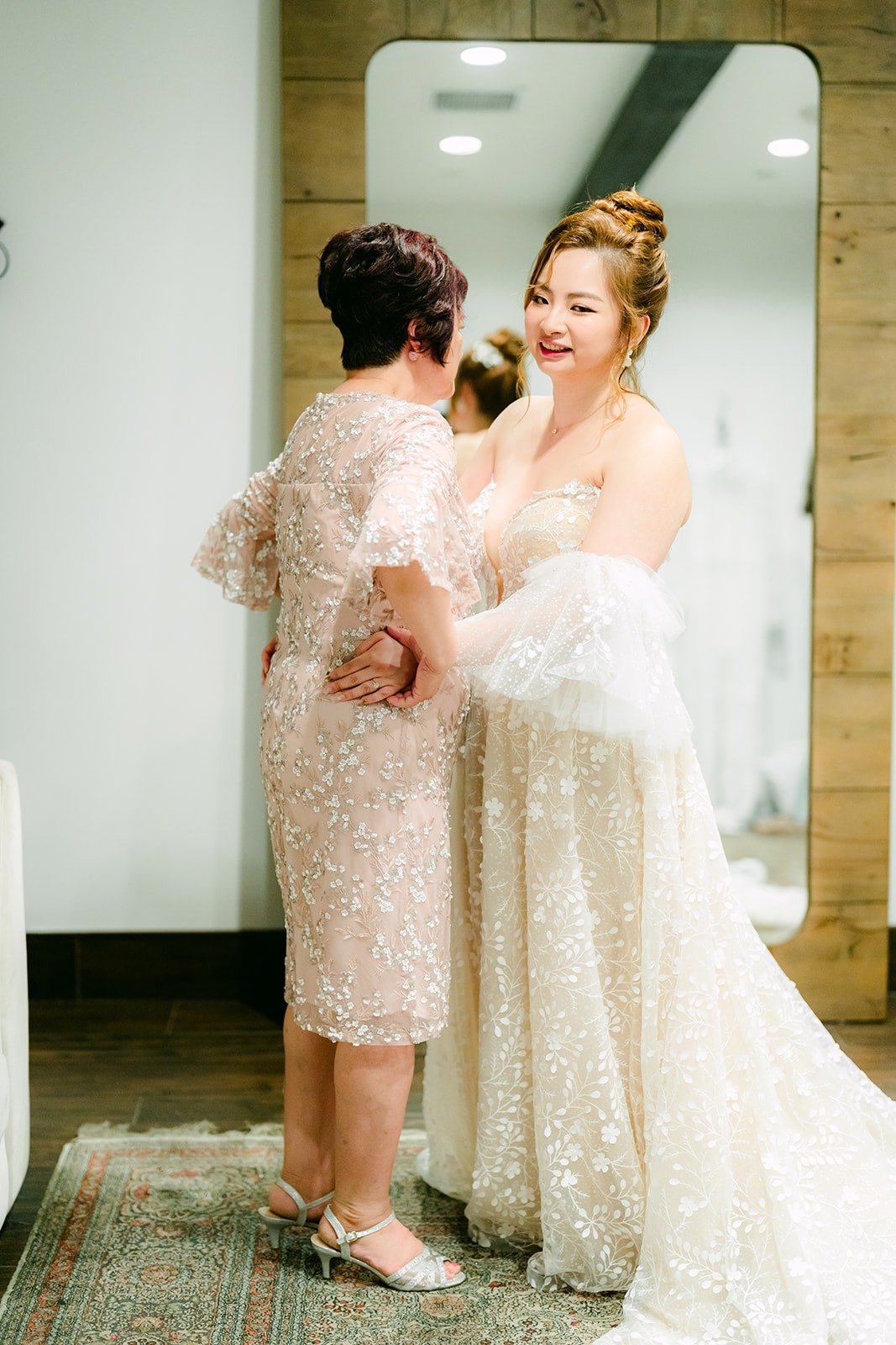 A family member hugging Joanna once she was dressed