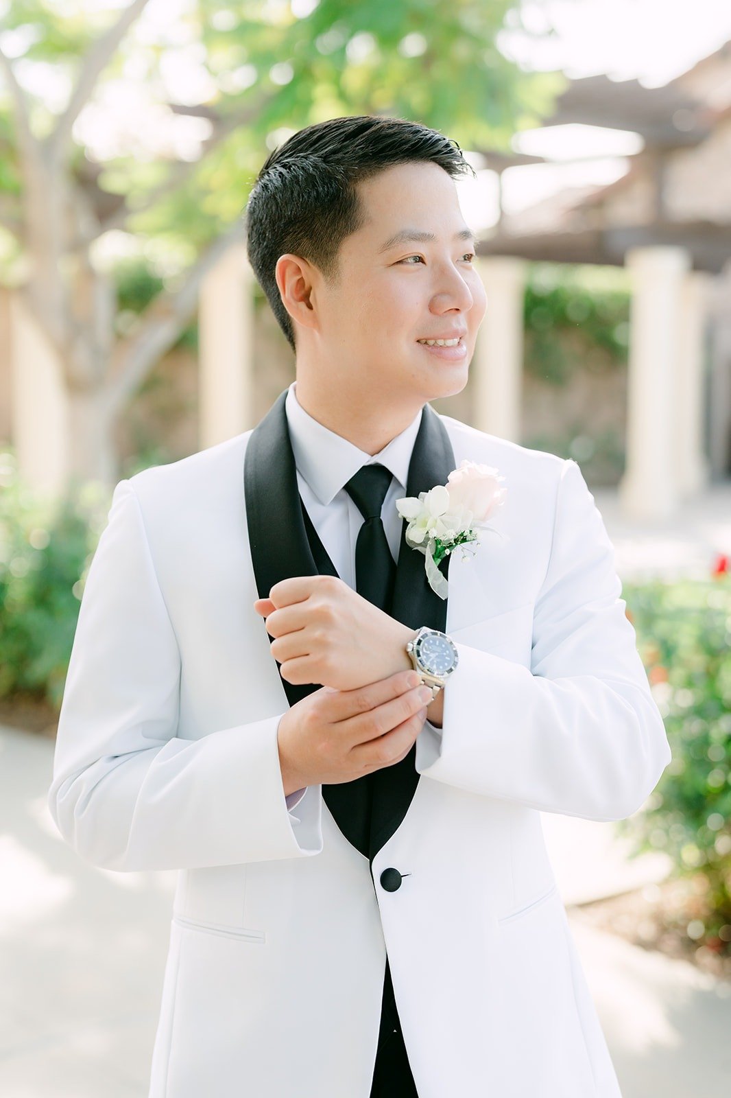 Chungman fixing his cuff, photographed by One and Only Production