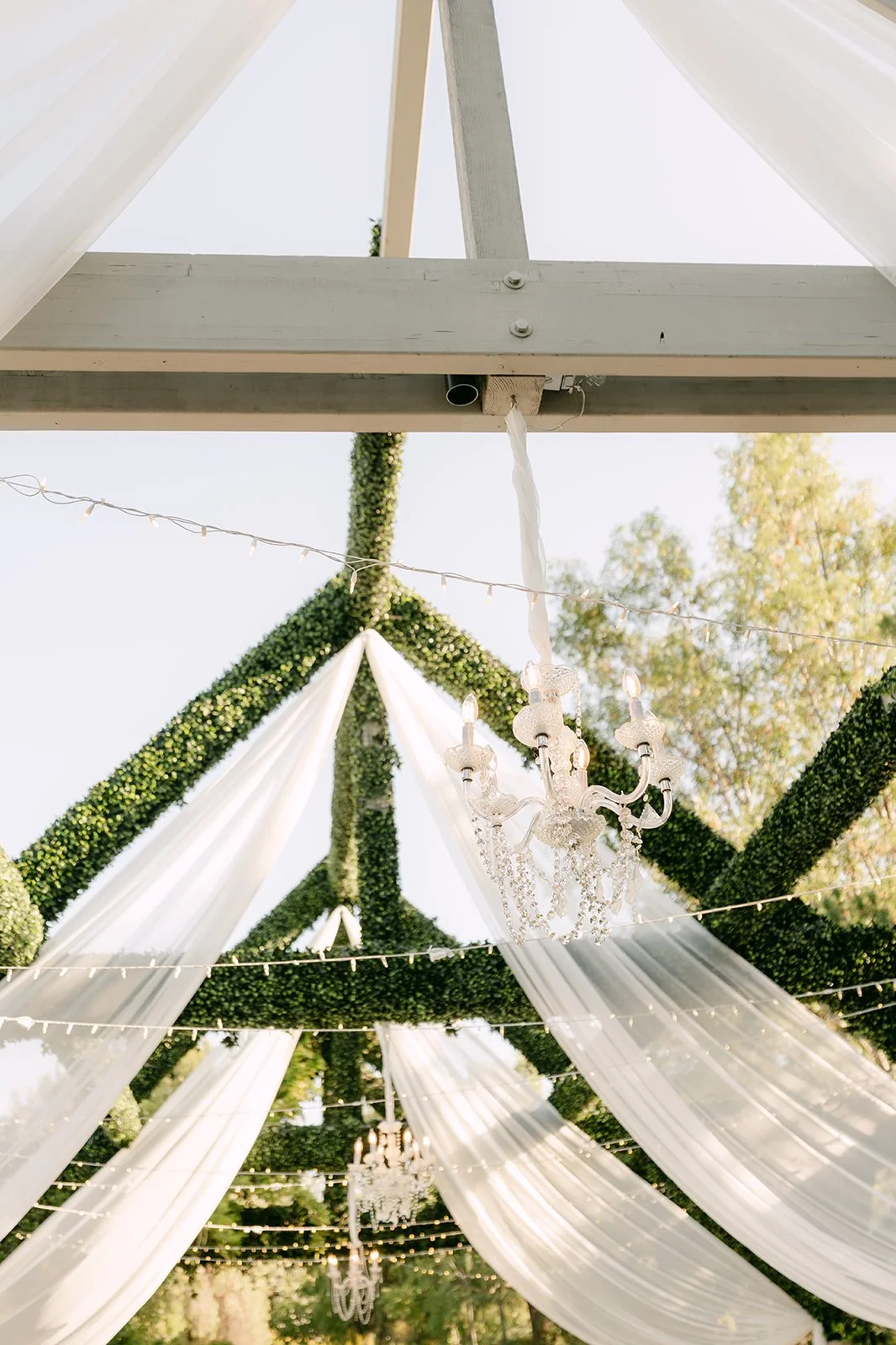 Sheer draping and greenery over the reception at Coyote Hills.