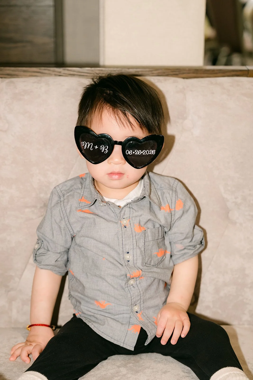 A little guest in heart sunglasses.