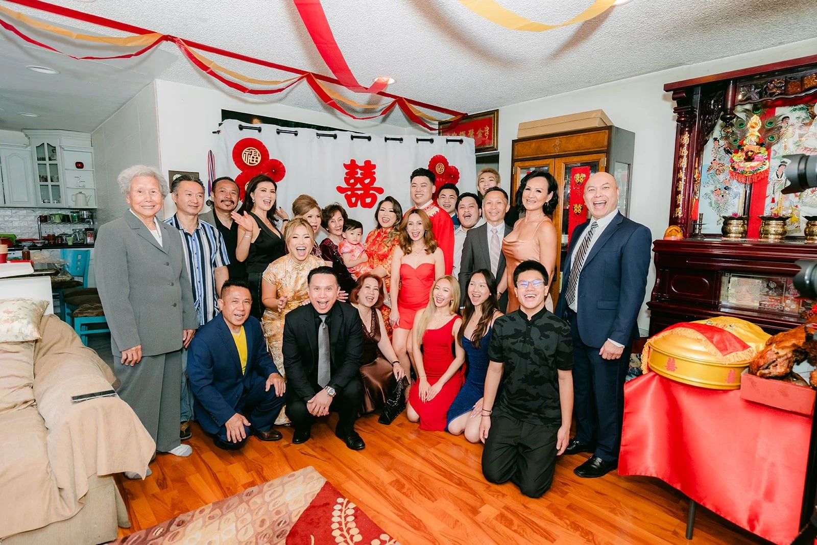 Candice and Vincent with family after the tea ceremony, photographed by One and Only Production