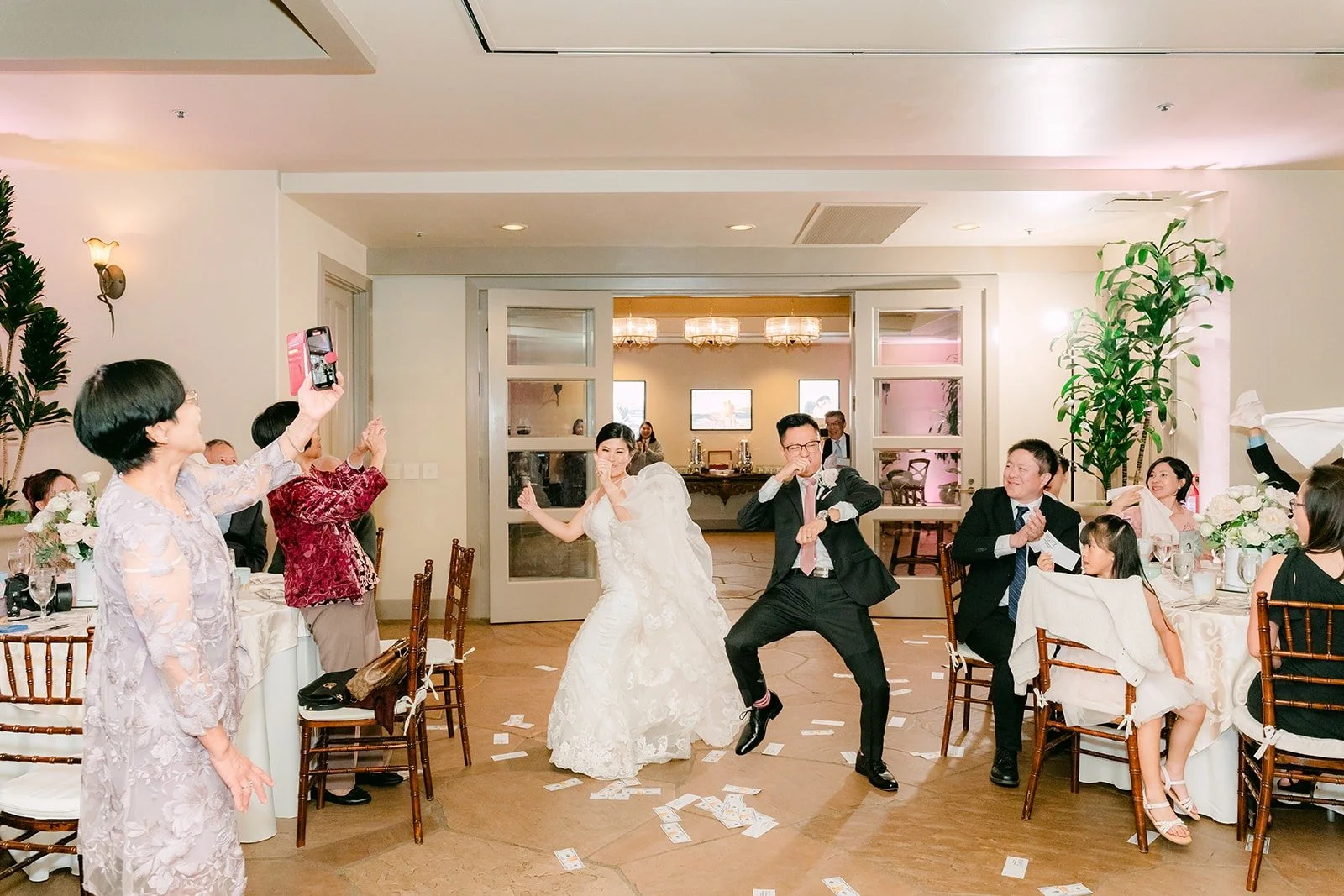 The wedding party dancing on the floor during the grand entrance