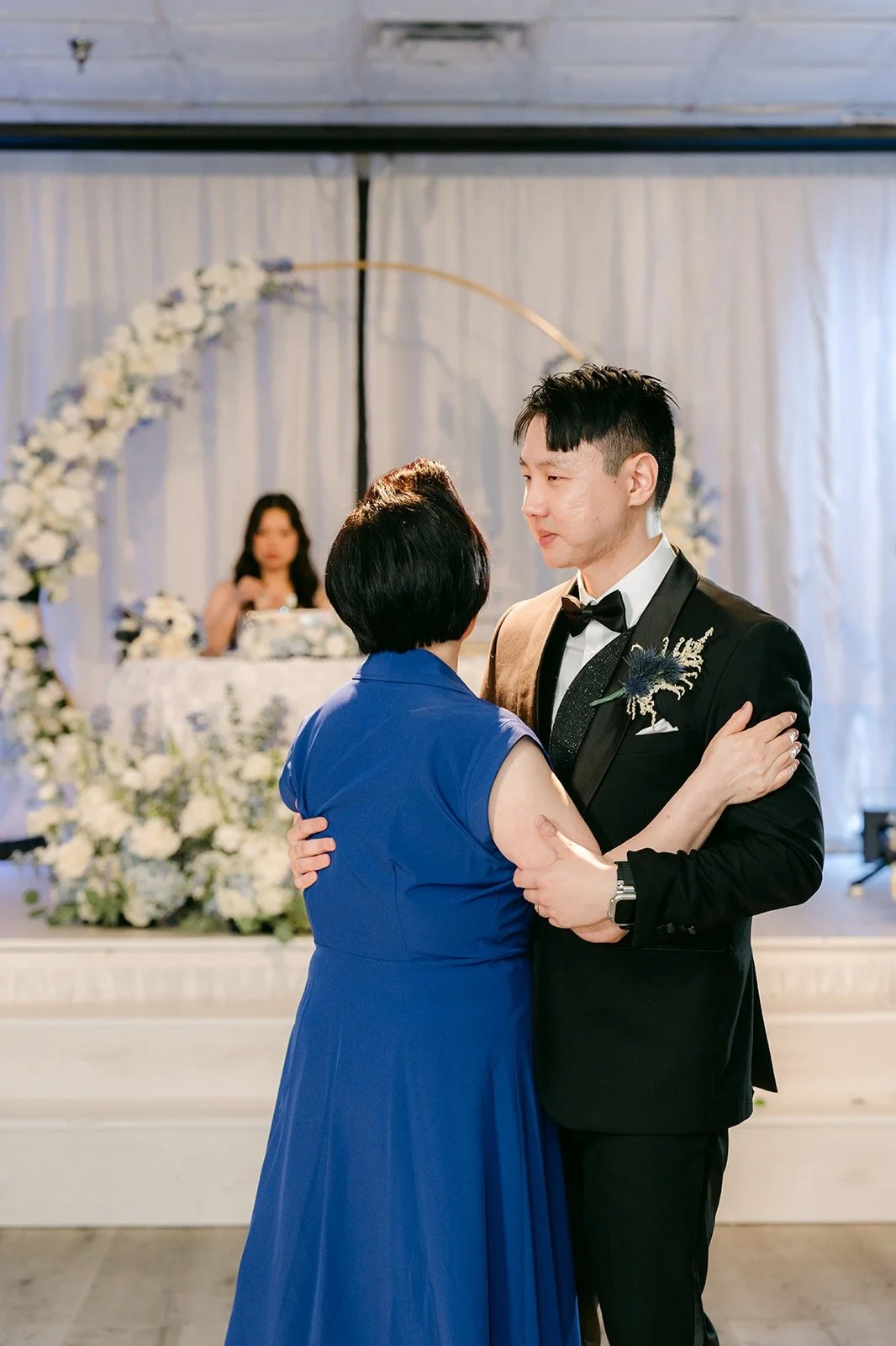 James and his mom smiling during their dance