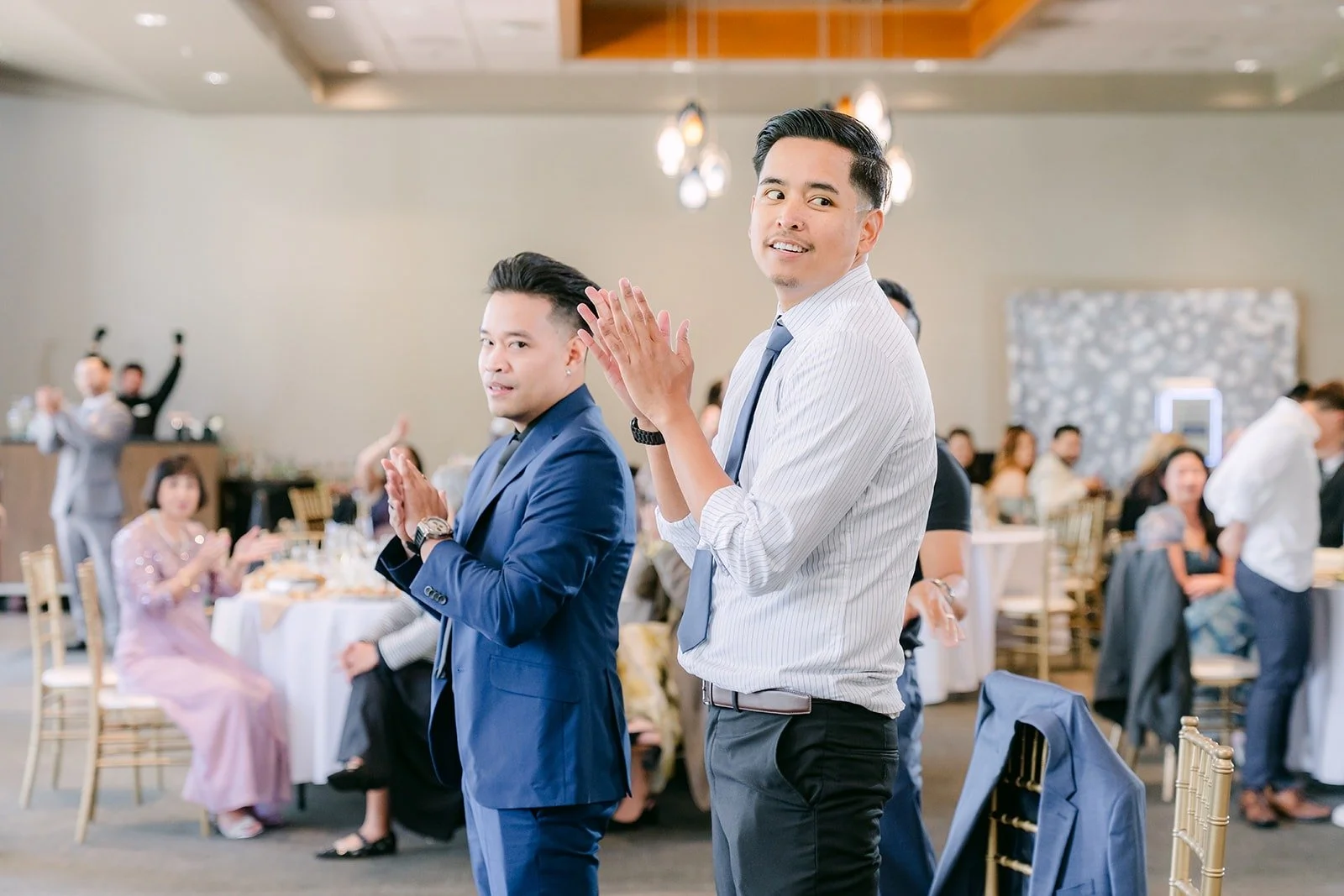 Guests cheering during the Find It game, photographed by One and Only Production
