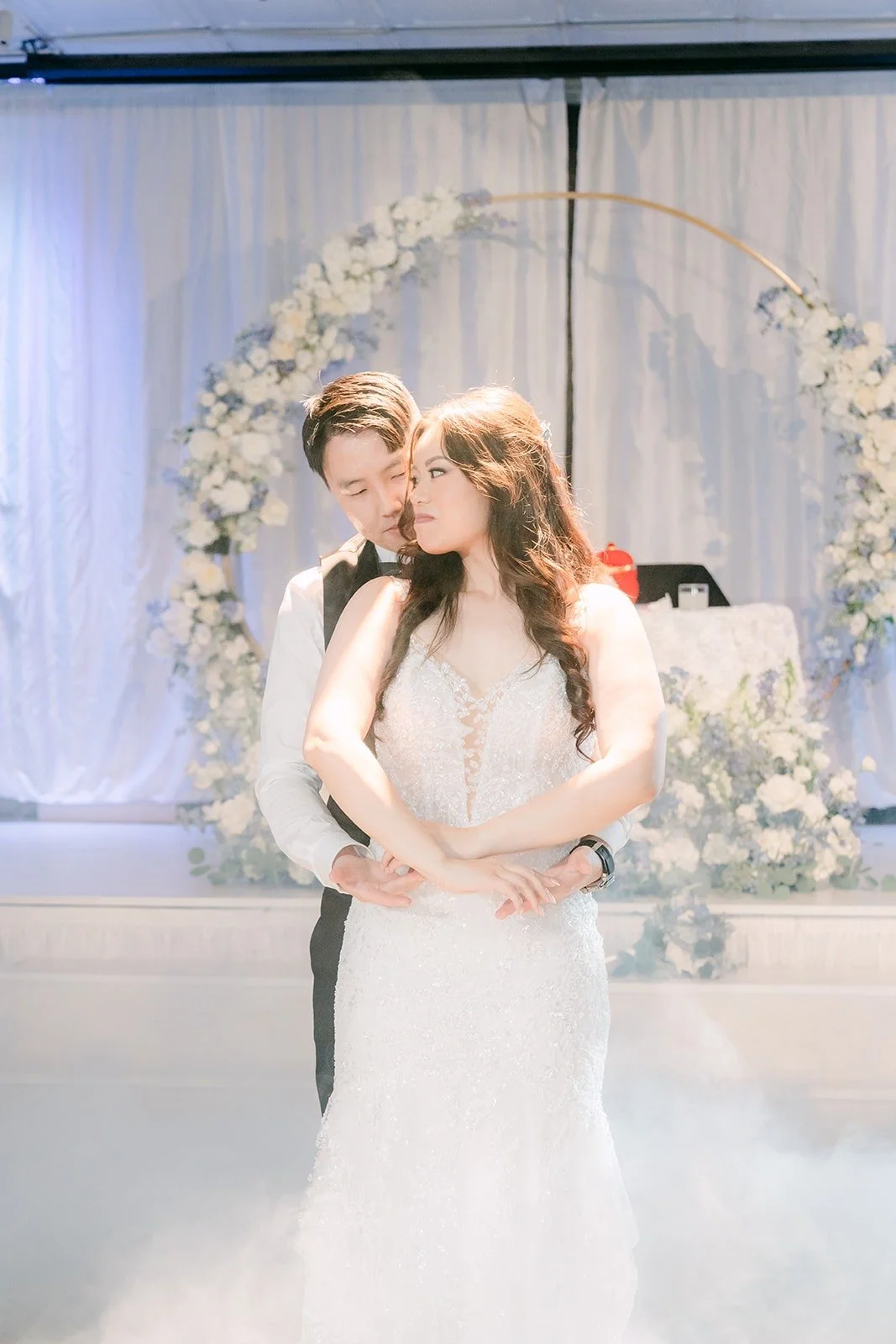James holding Emily close during the first dance