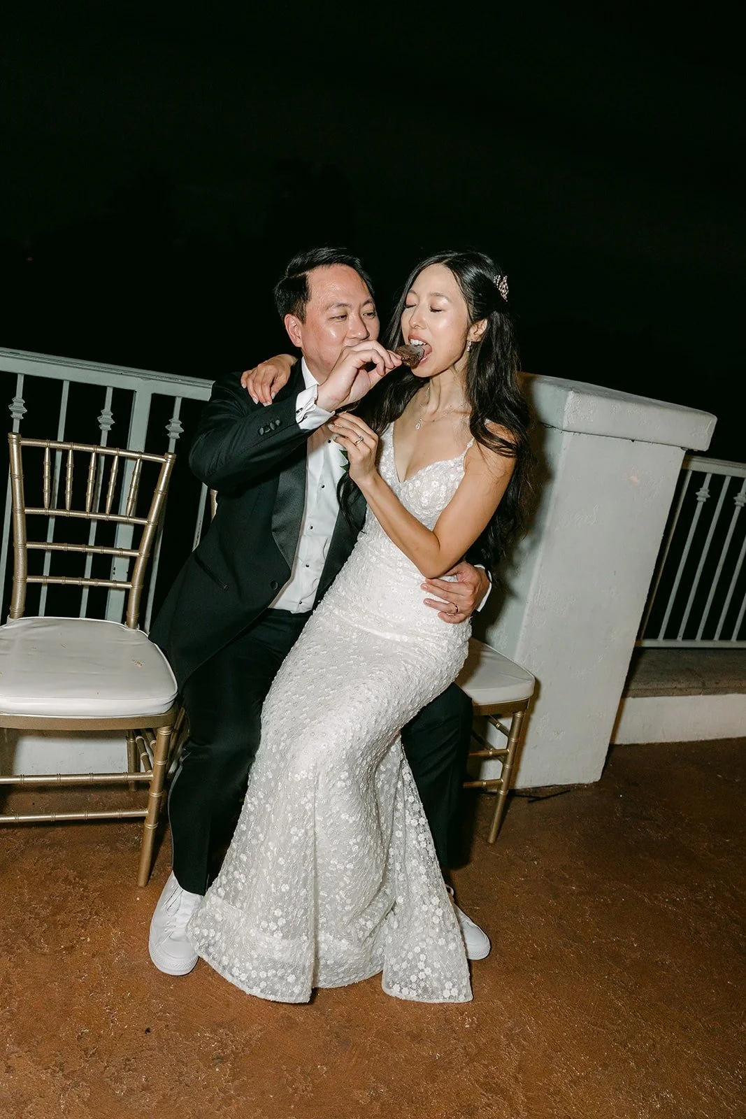 Kristine and William striking a playful pose at the late night party