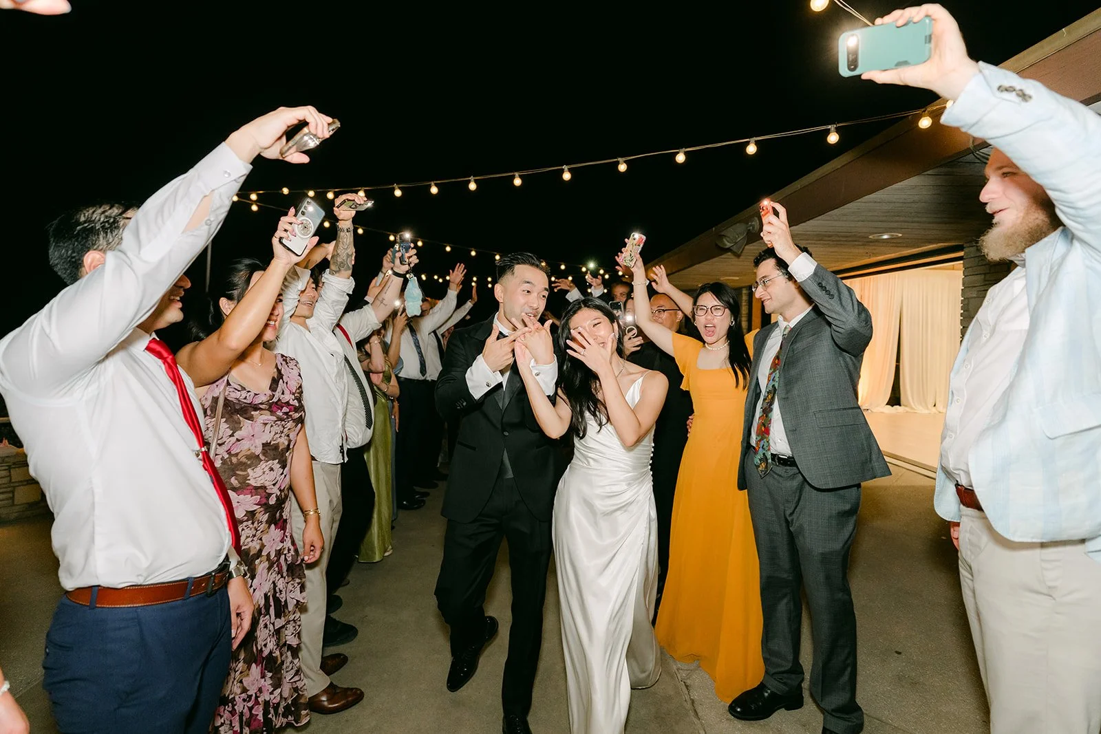 Phone lights raised for Kim and Vincent's last dance