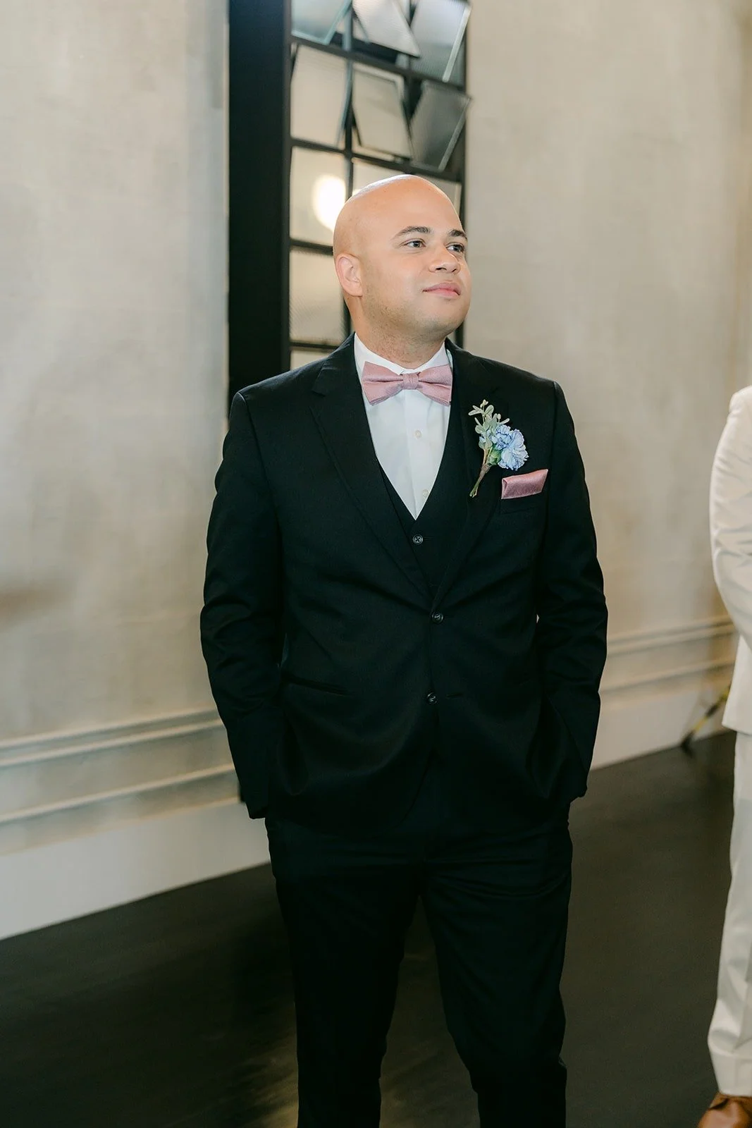 Brandon waits at the front as Elisa comes down the aisle
