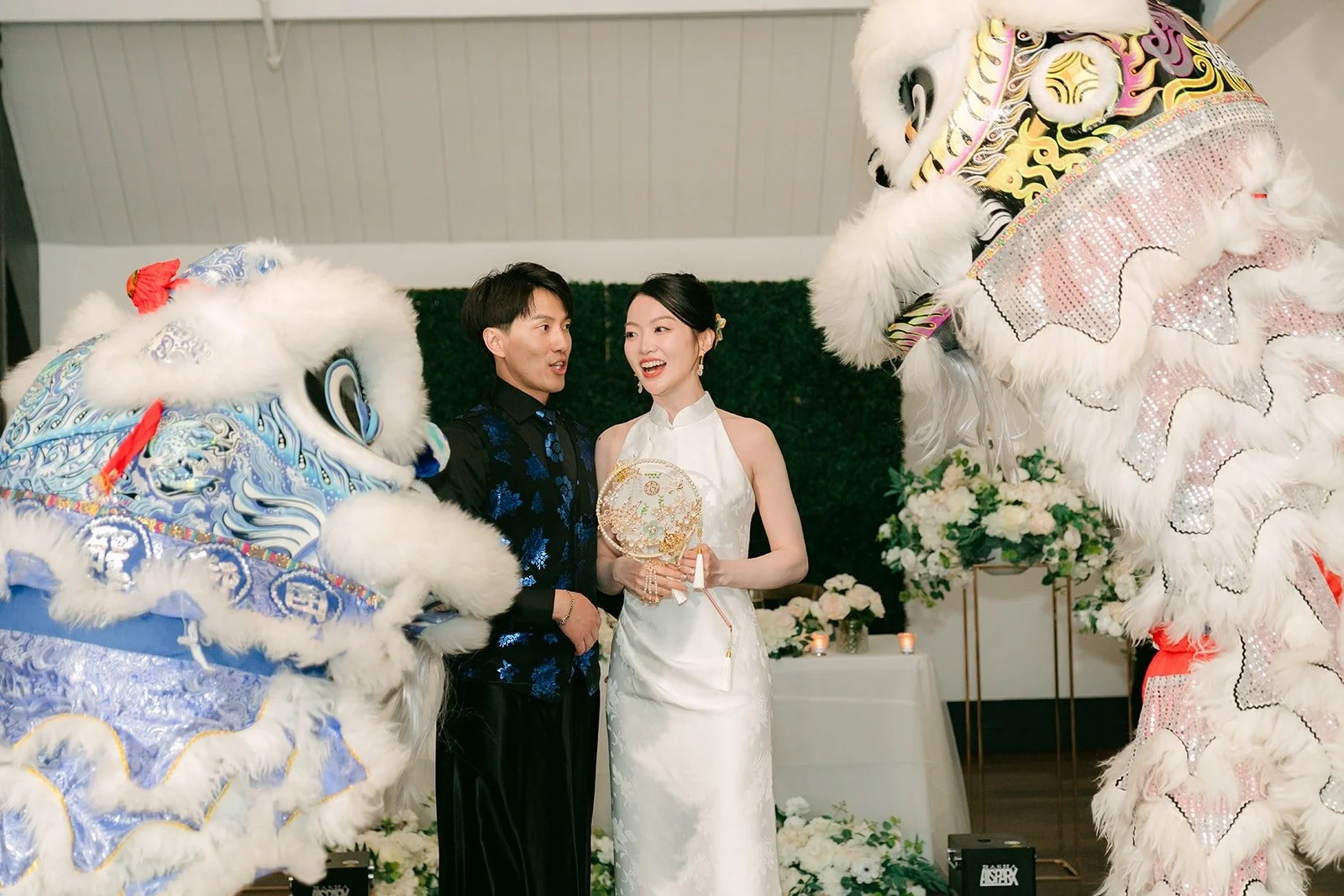 Tin and Fong laughing with the lions