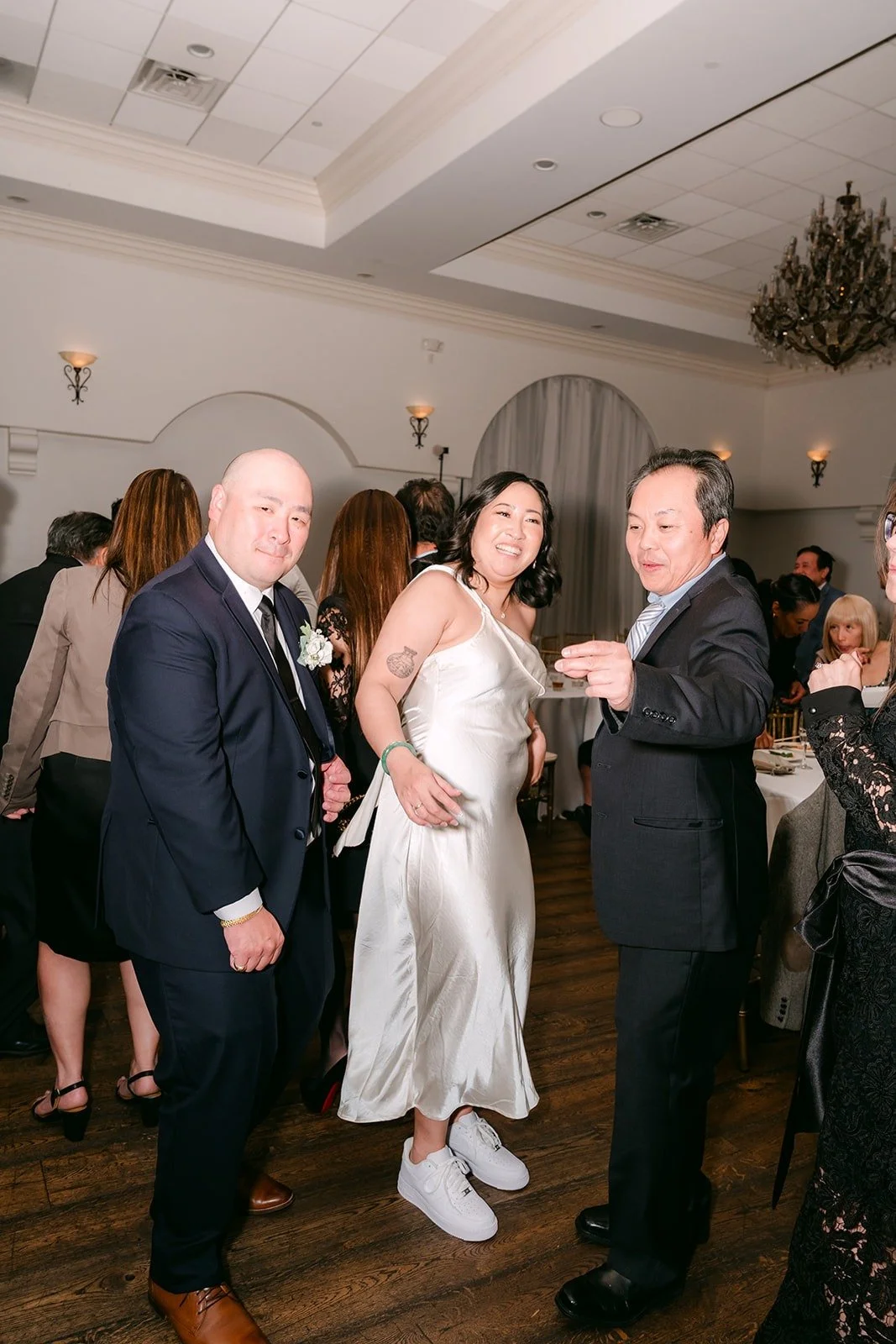 Vivian and Yao dancing with guests