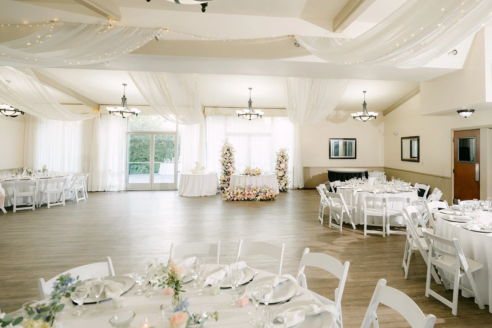 The bright reception room at Skylinks Golf Course set for dinner