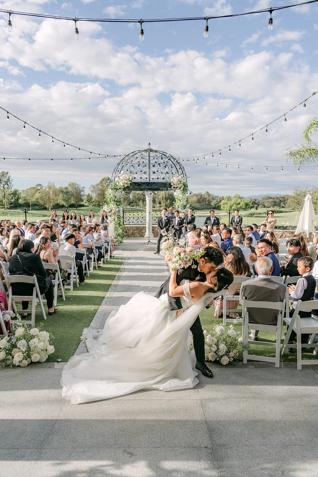 A dip kiss down the aisle