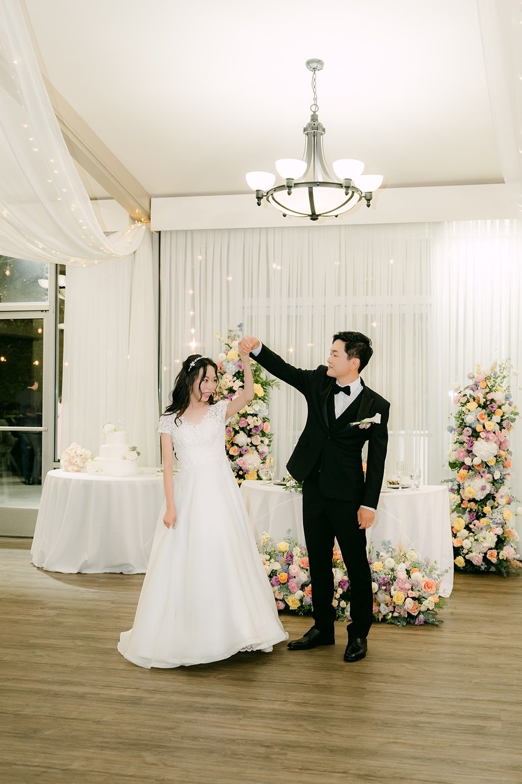 Jeannie and Eunsang finishing their first dance, photographed by One and Only Production