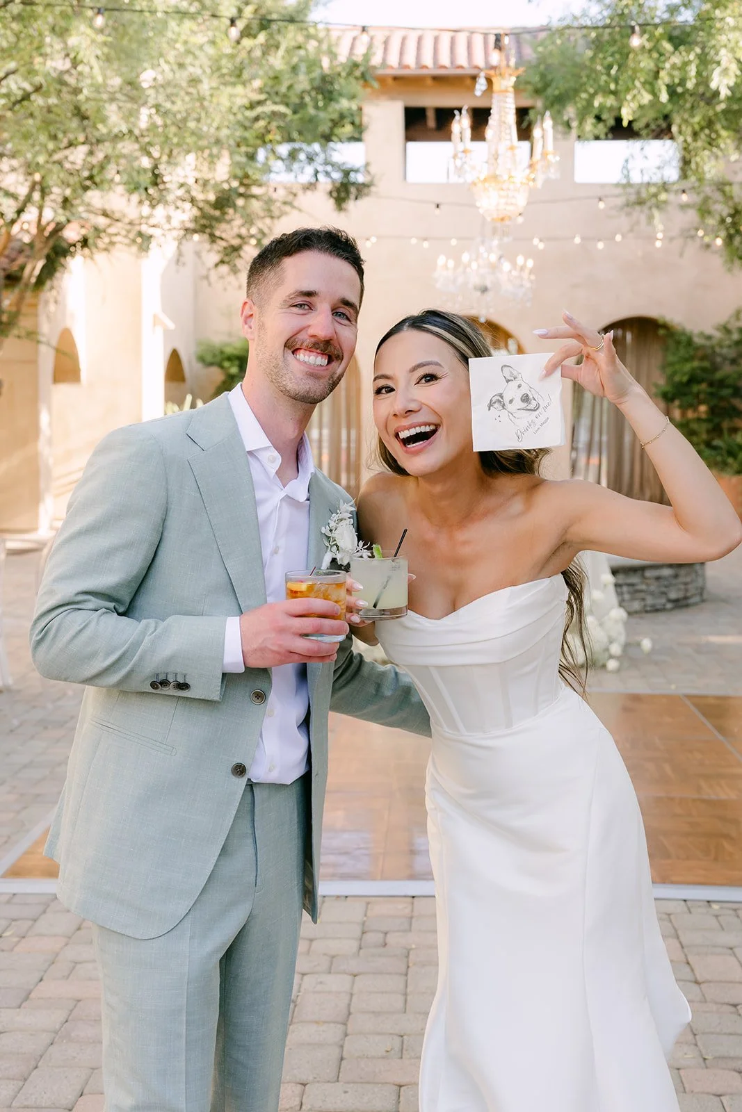Kieu and Anthony toasting at their reception