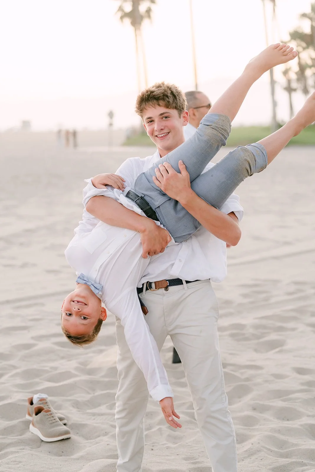 Guests goofing around on the sand