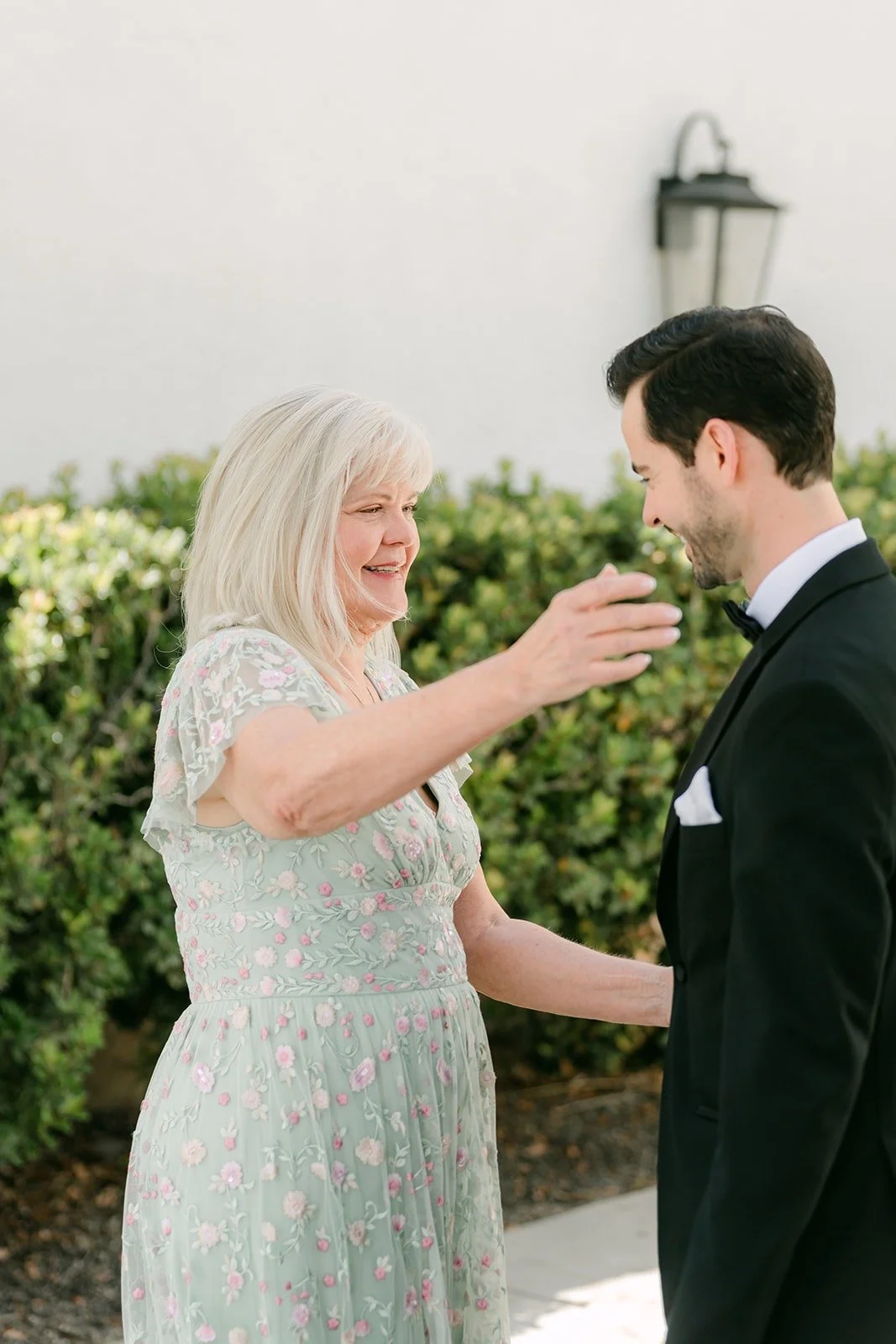 Kevin's mom seeing him in his tuxedo for the first time