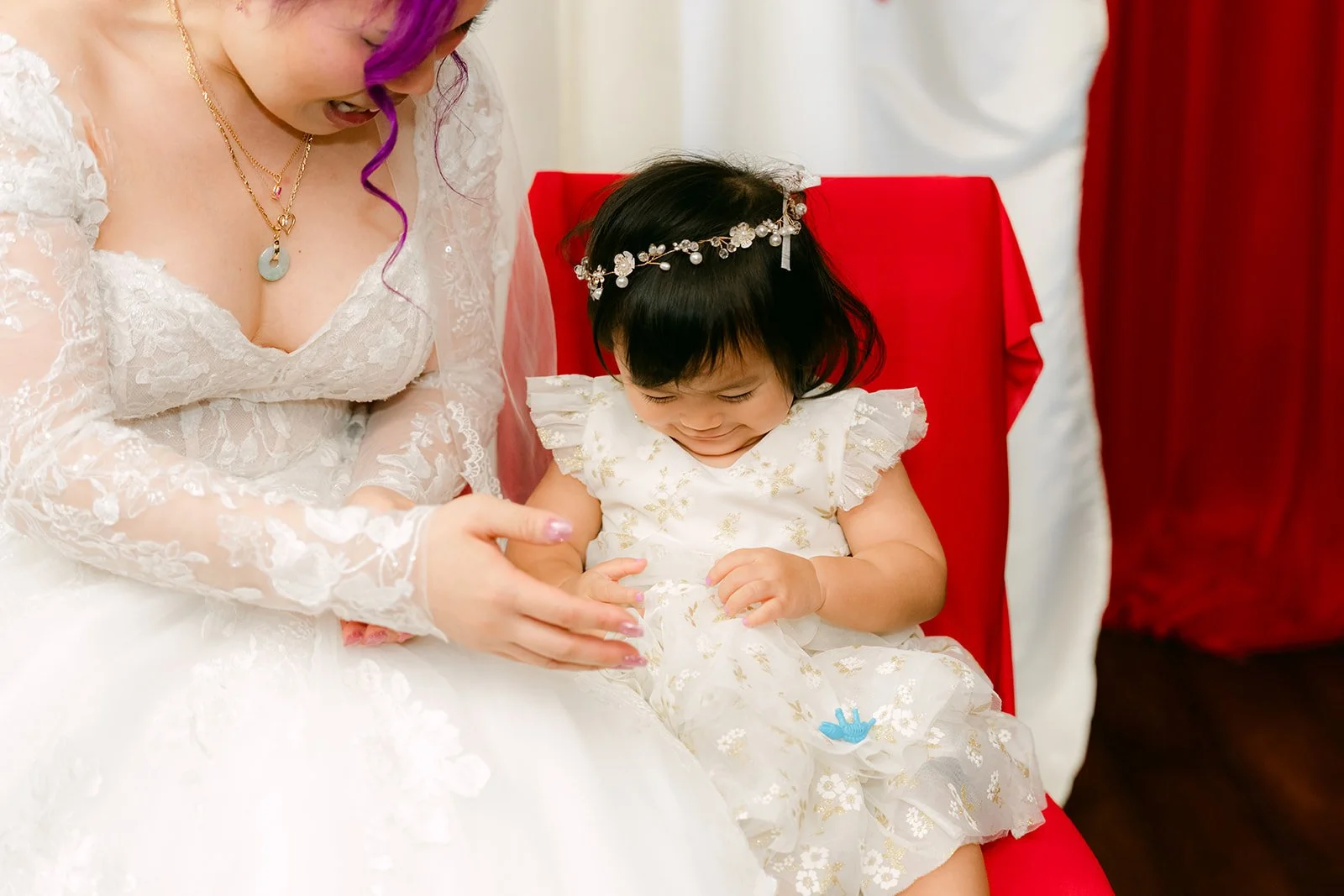 Vanessa holding her niece on her lap.