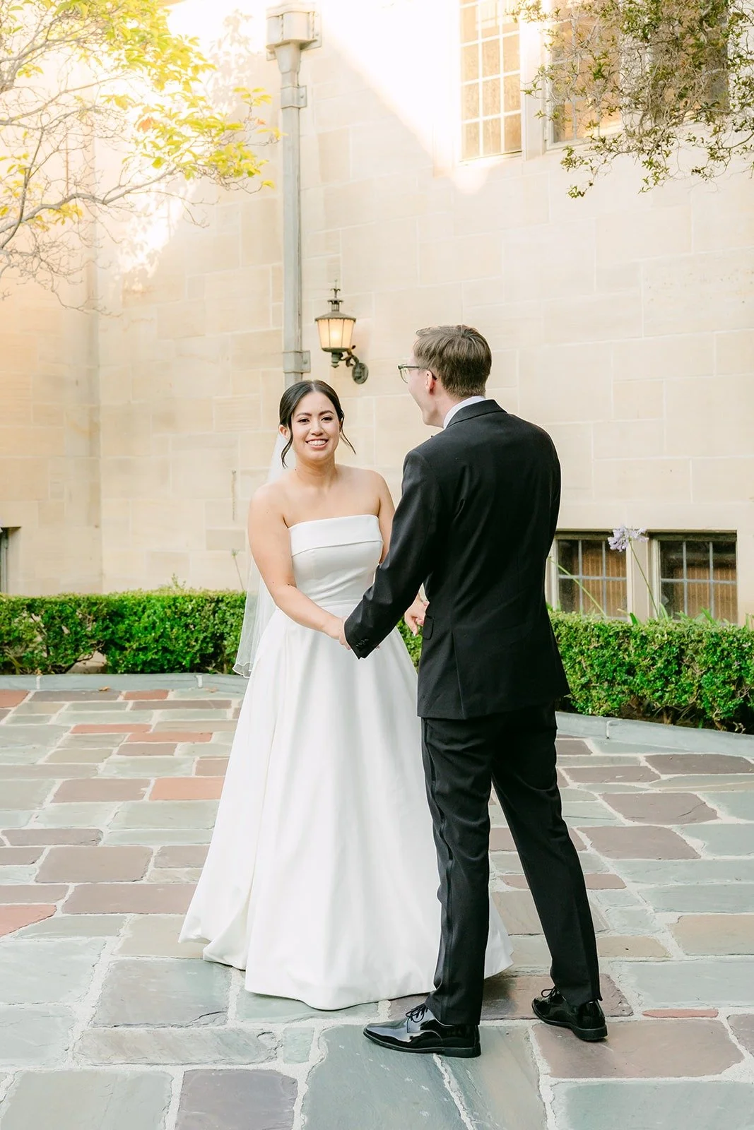 Brianna and Nik starting their first dance in the courtyard