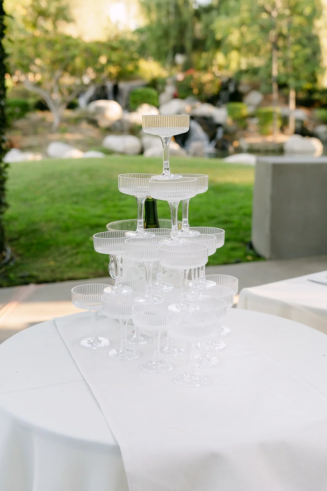 The champagne tower waiting on the lawn at Coyote Hills.