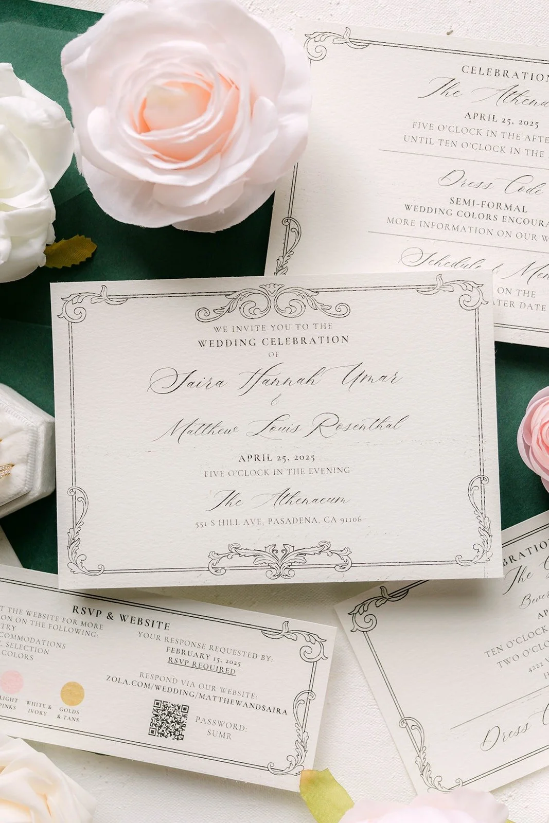 A close look at the invitation with its lettered names and a blush rose
