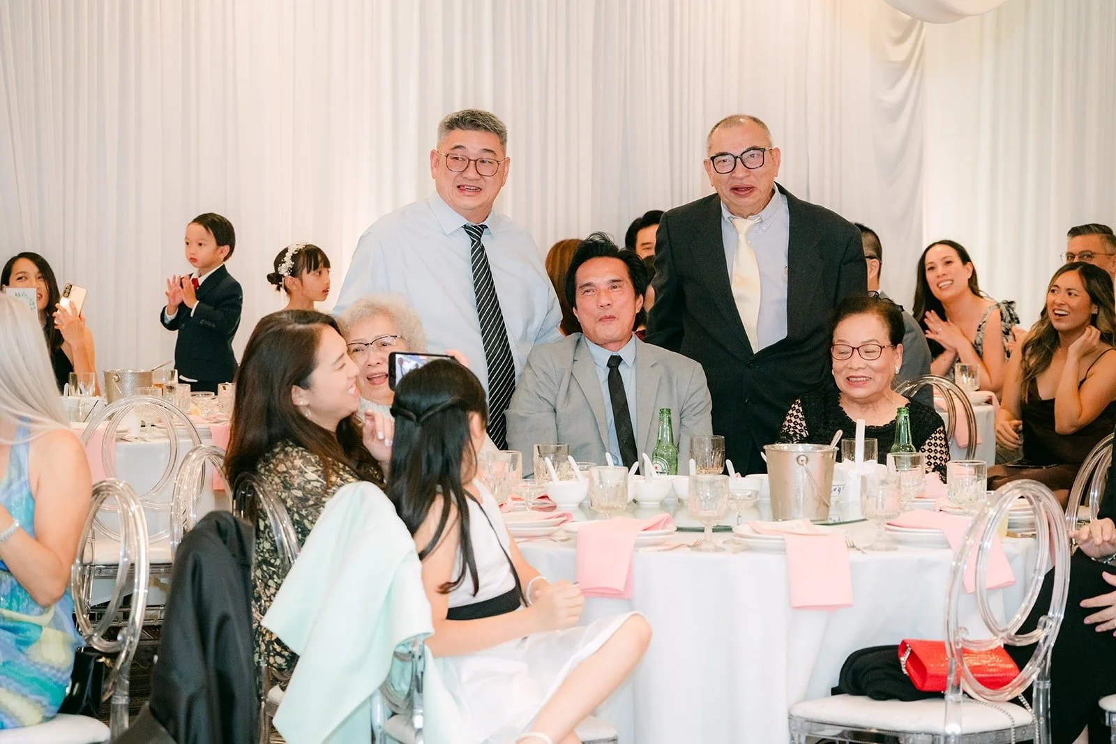 Family members laughing at the speeches