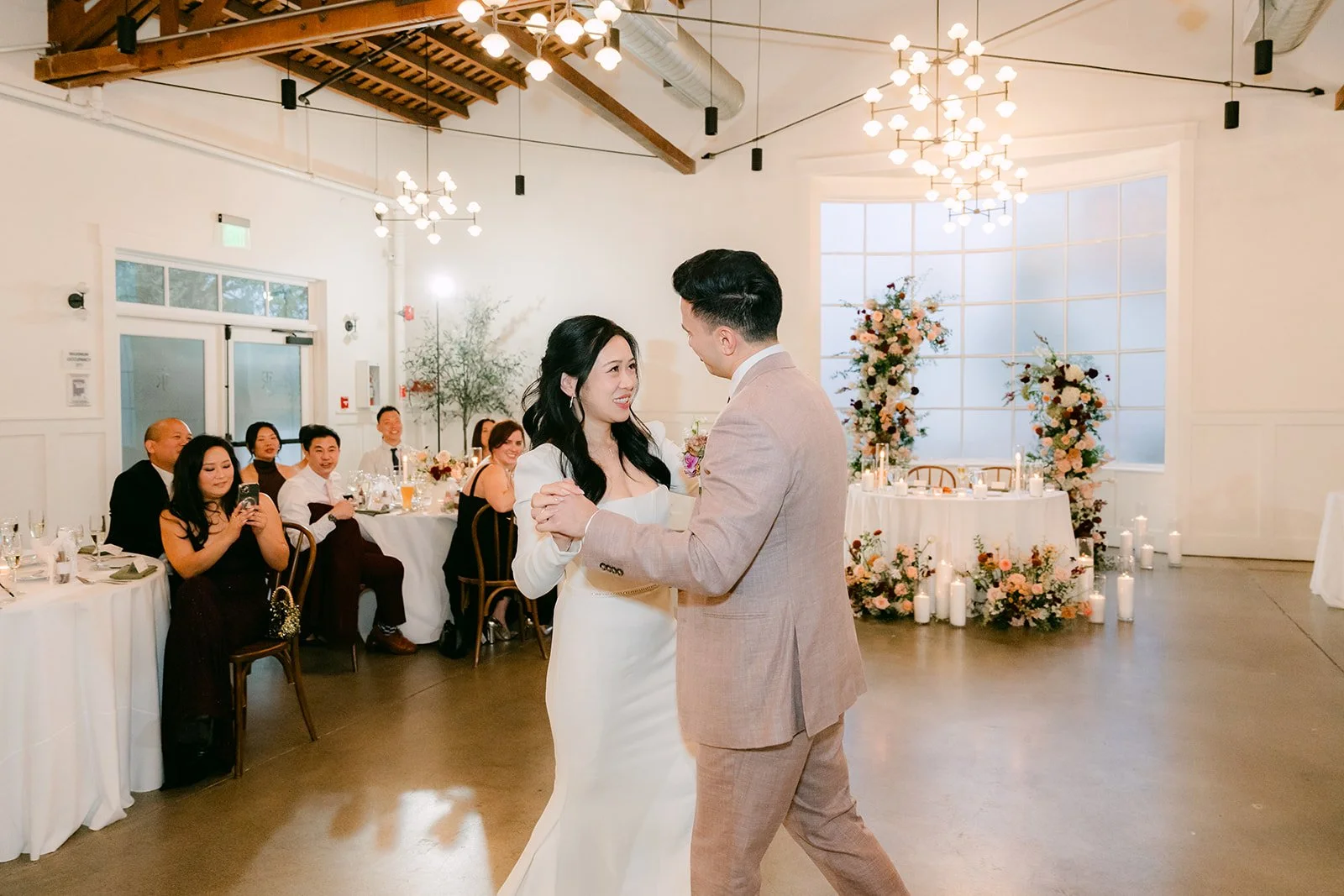 Denise and Michael's first dance in the ballroom under the chandeliers.