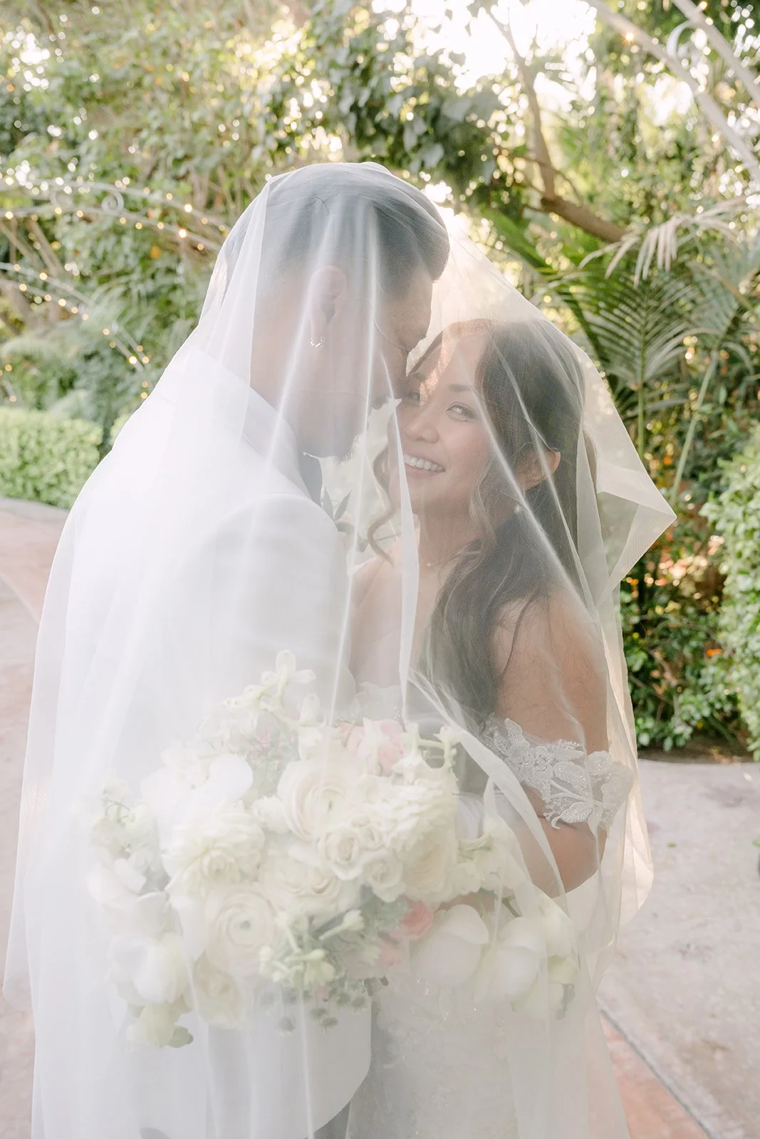 Nicole and Caryl under her veil together, a photo they asked for.
