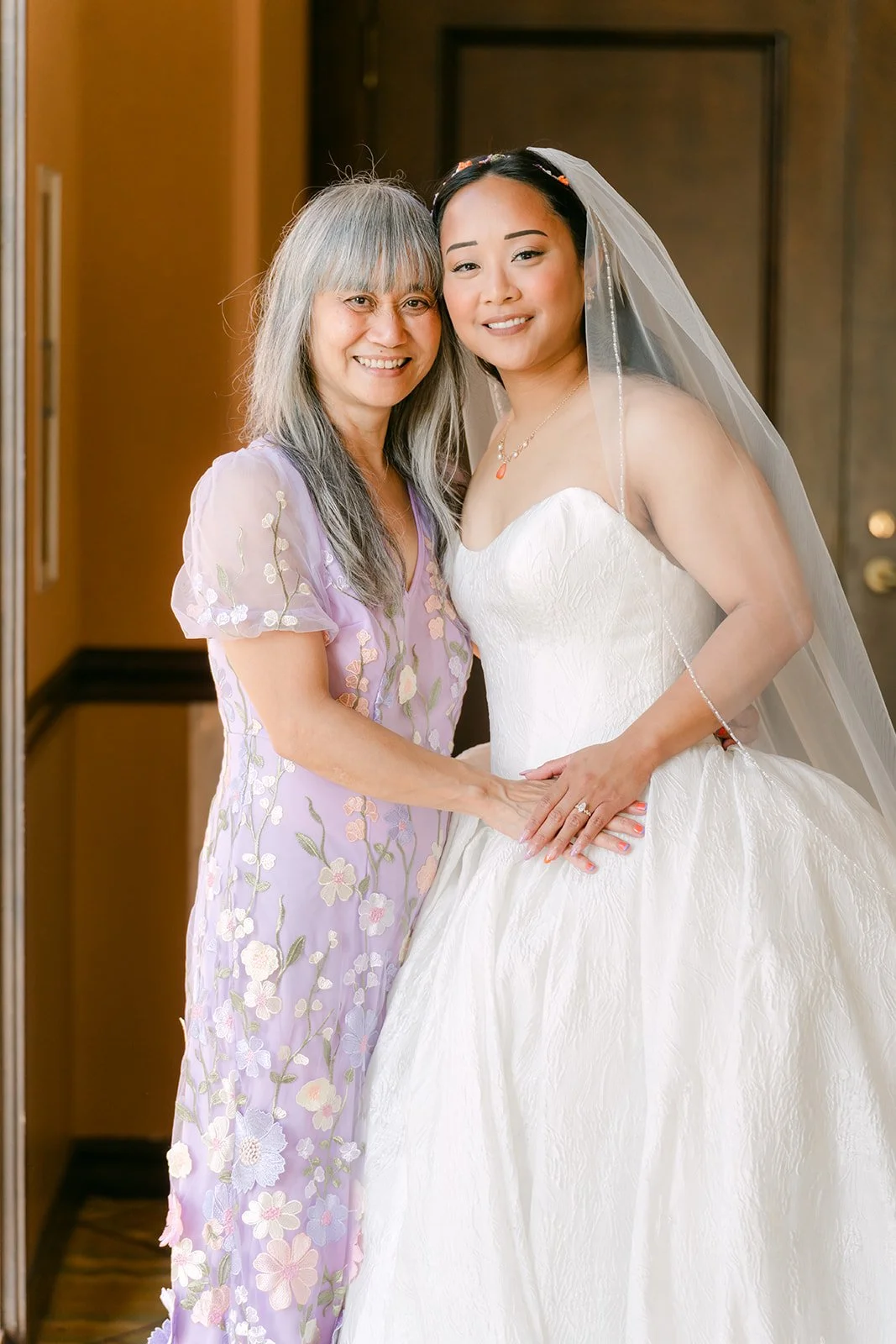 Angela and her mom smiling together