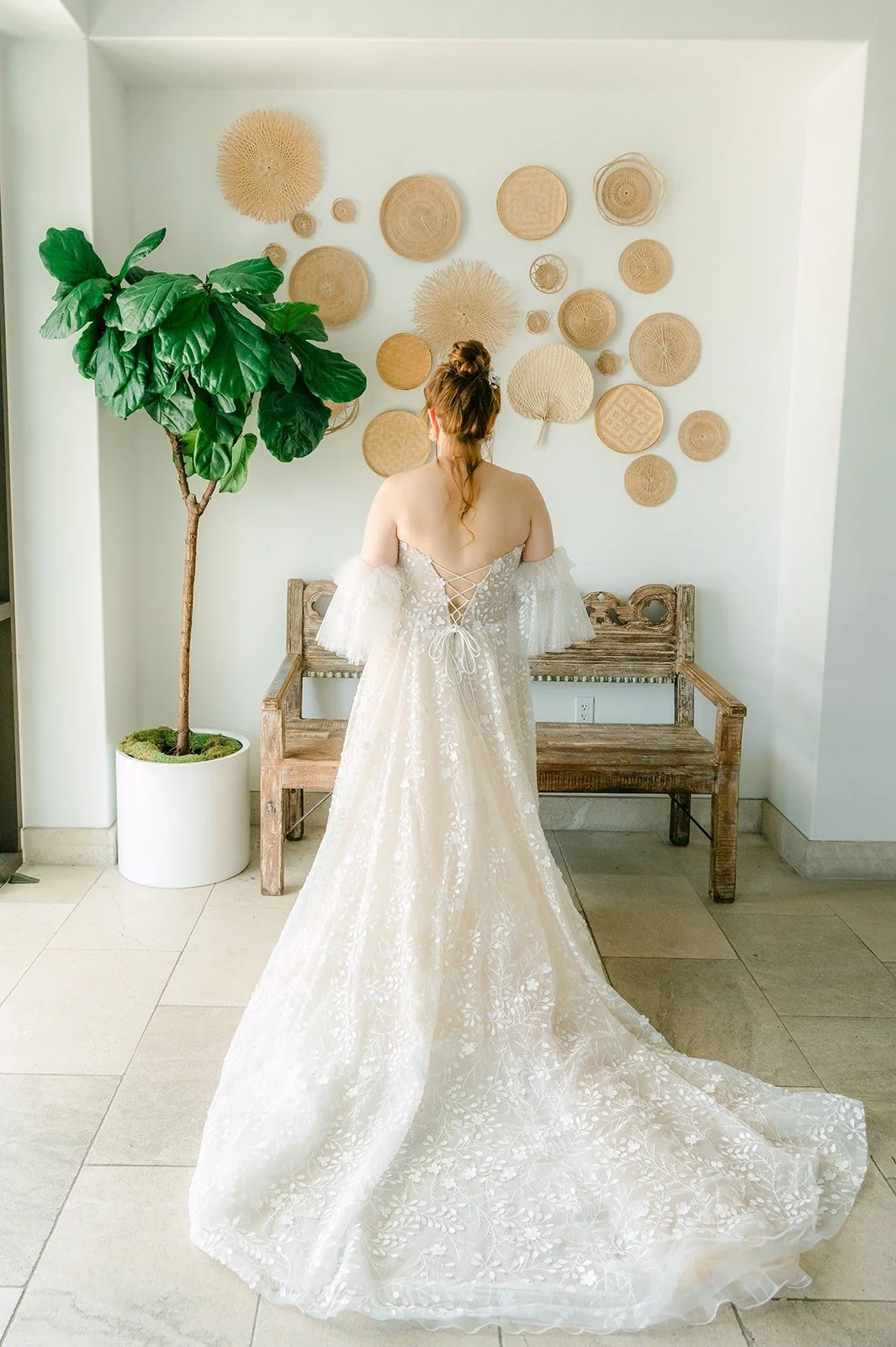 Joanna's lace up back and long train in the suite