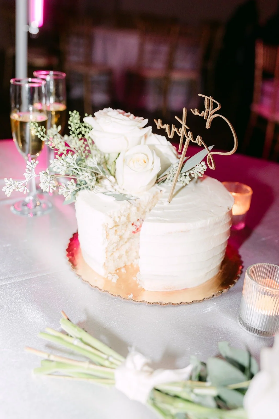 The cake glowing under the reception lights