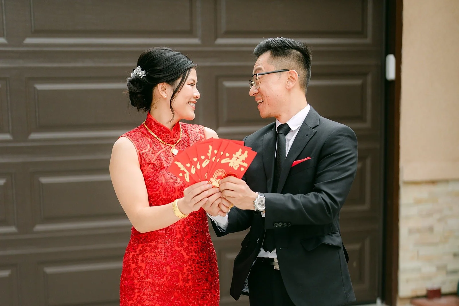 Alex greeting Xuemin in her red cheongsam after the door games