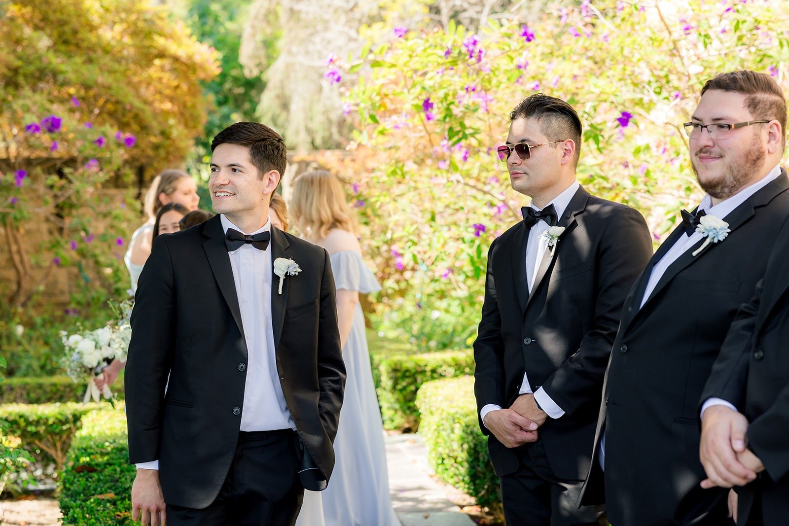 Nik and his groomsmen in the garden
