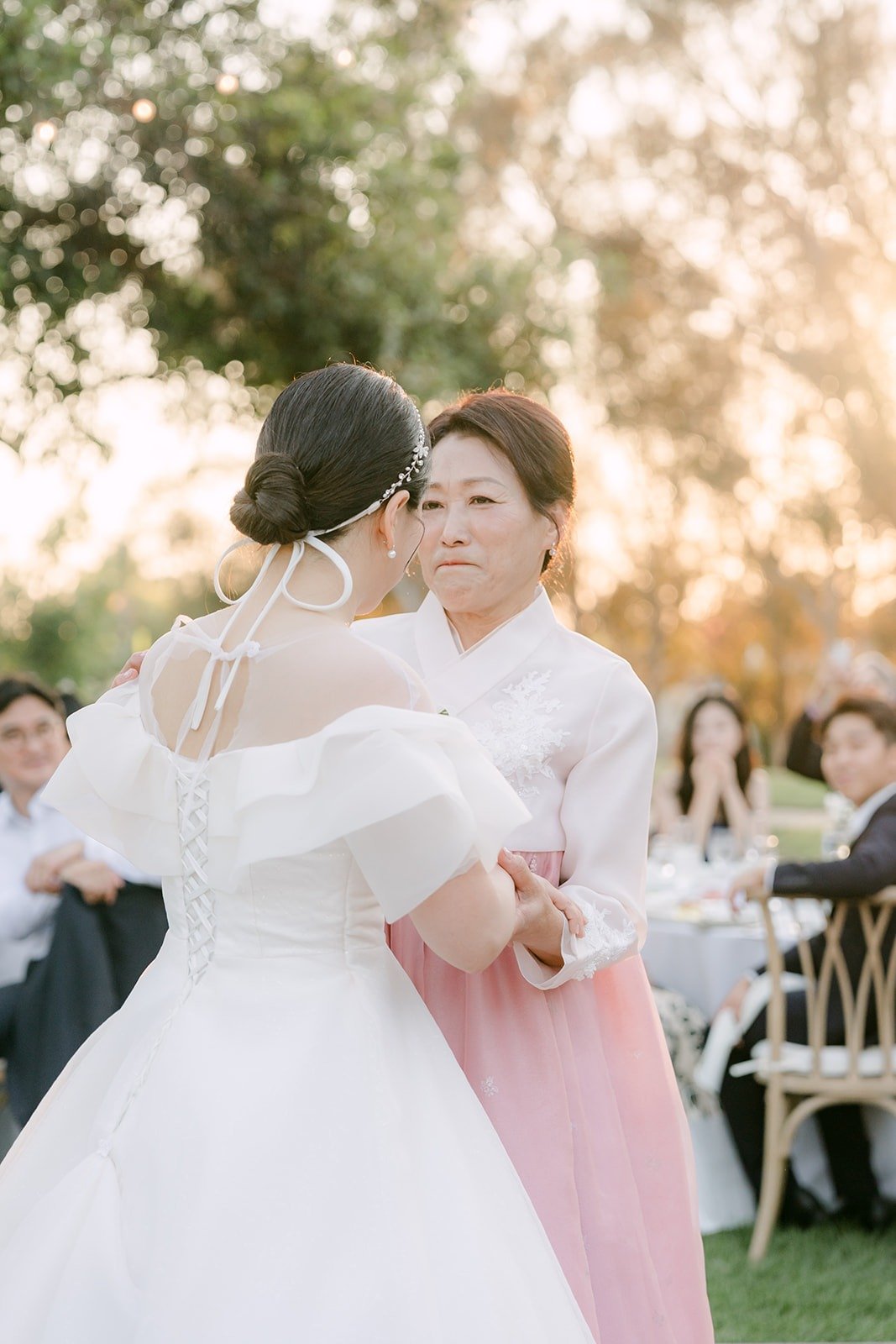 Amy hugging her mom on the dance floor
