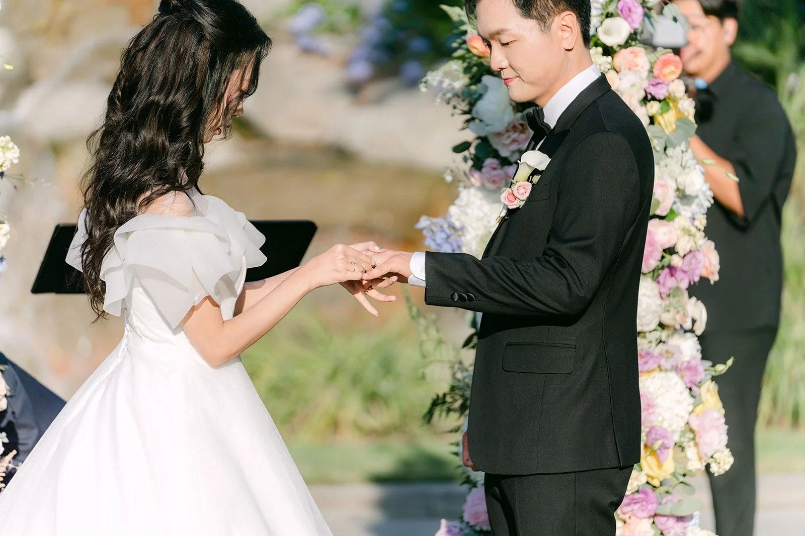 Jeannie and Eunsang exchanging rings