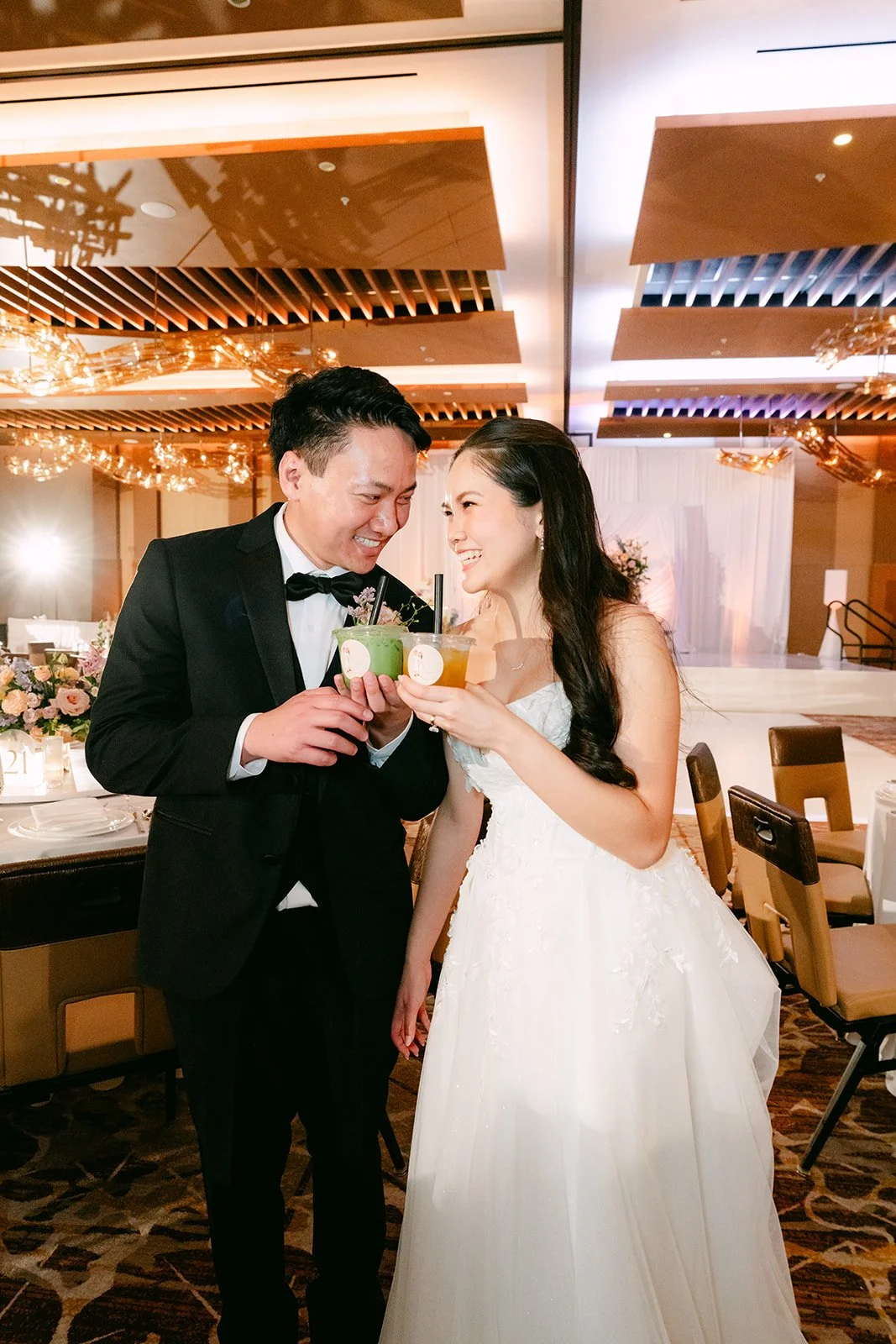 Bride and groom toasting at the Arbor Ballroom reception