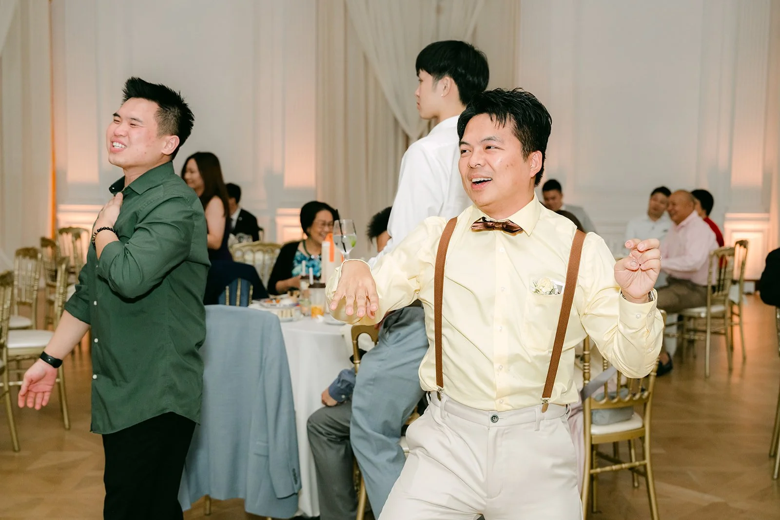 Groomsmen hamming it up during the reception games.