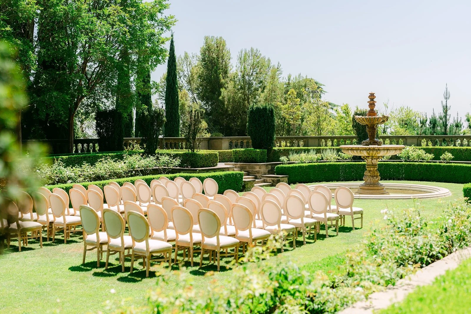 Ceremony chairs set on the lower lawn at Greystone Mansion