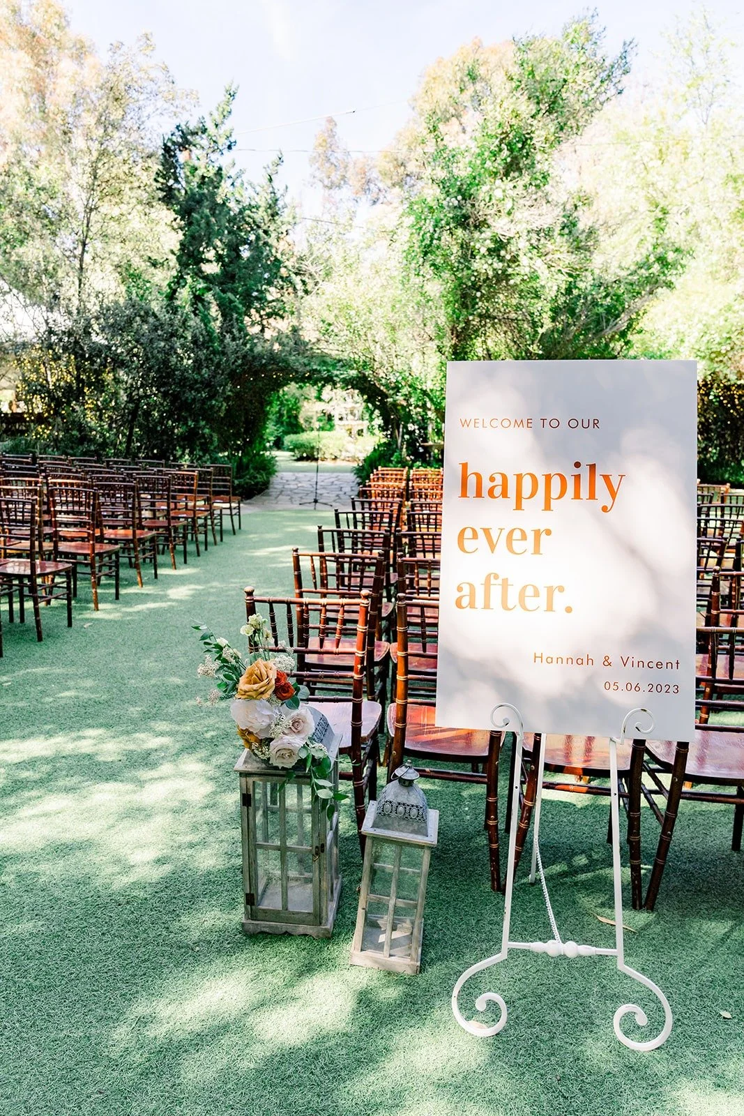 Happily ever after welcome sign at the ceremony aisle