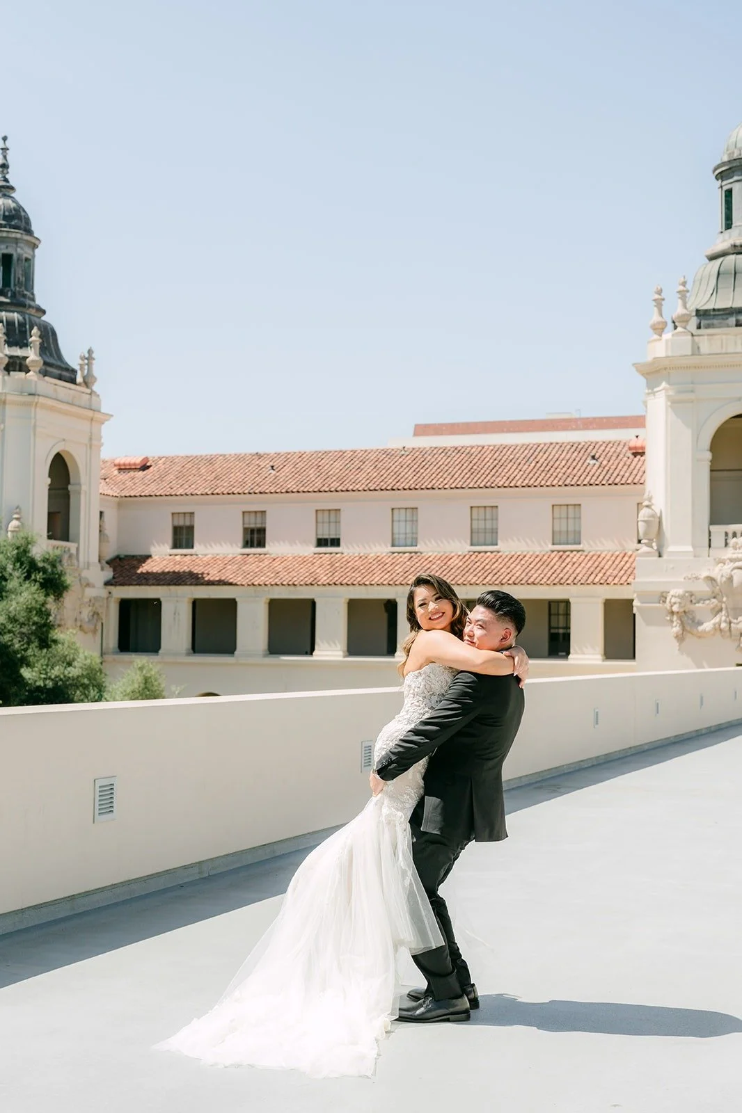 Vincent lifting Candice on the terrace at Pasadena City Hall