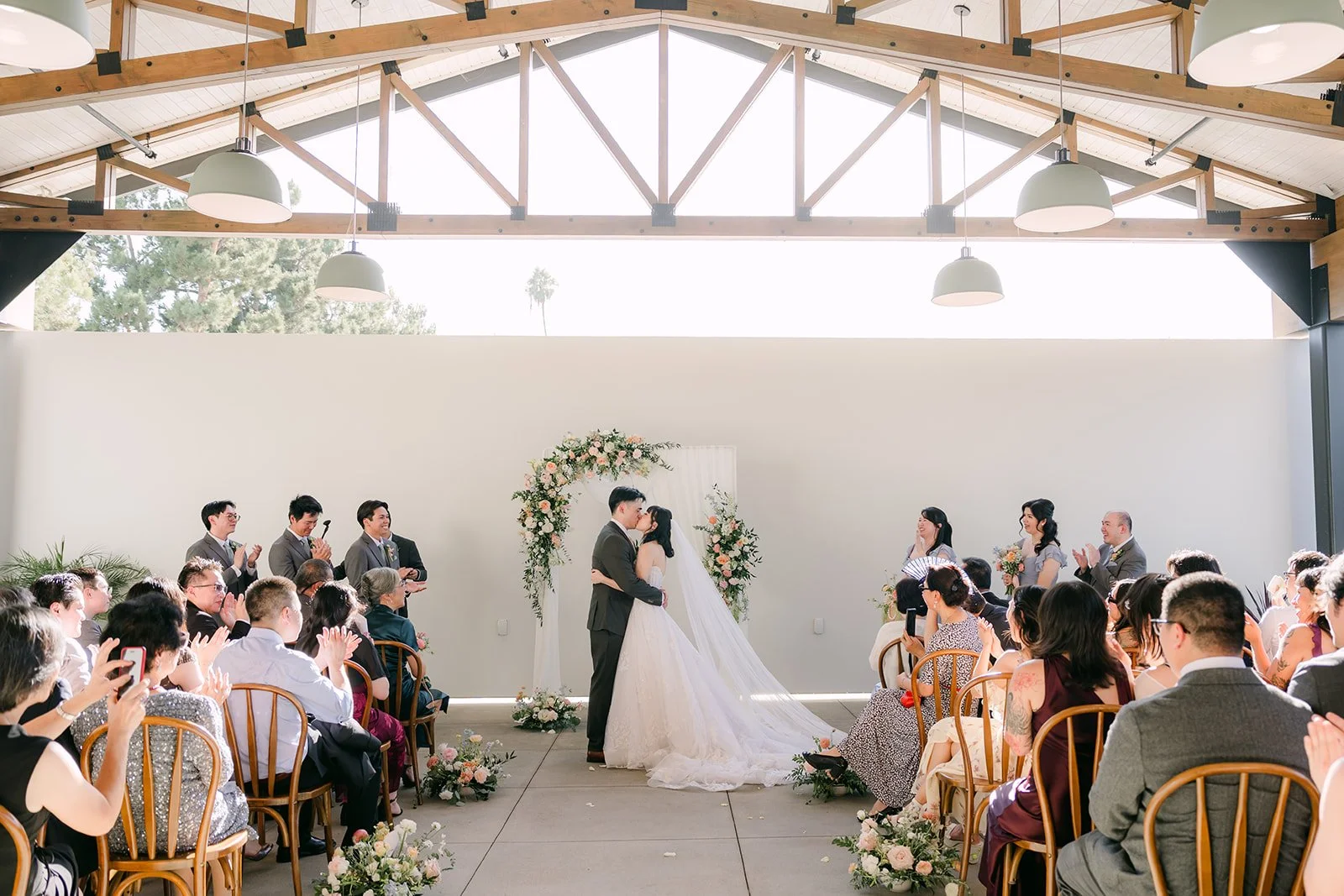 Wide view of the ceremony with guests under the Pavilion roof