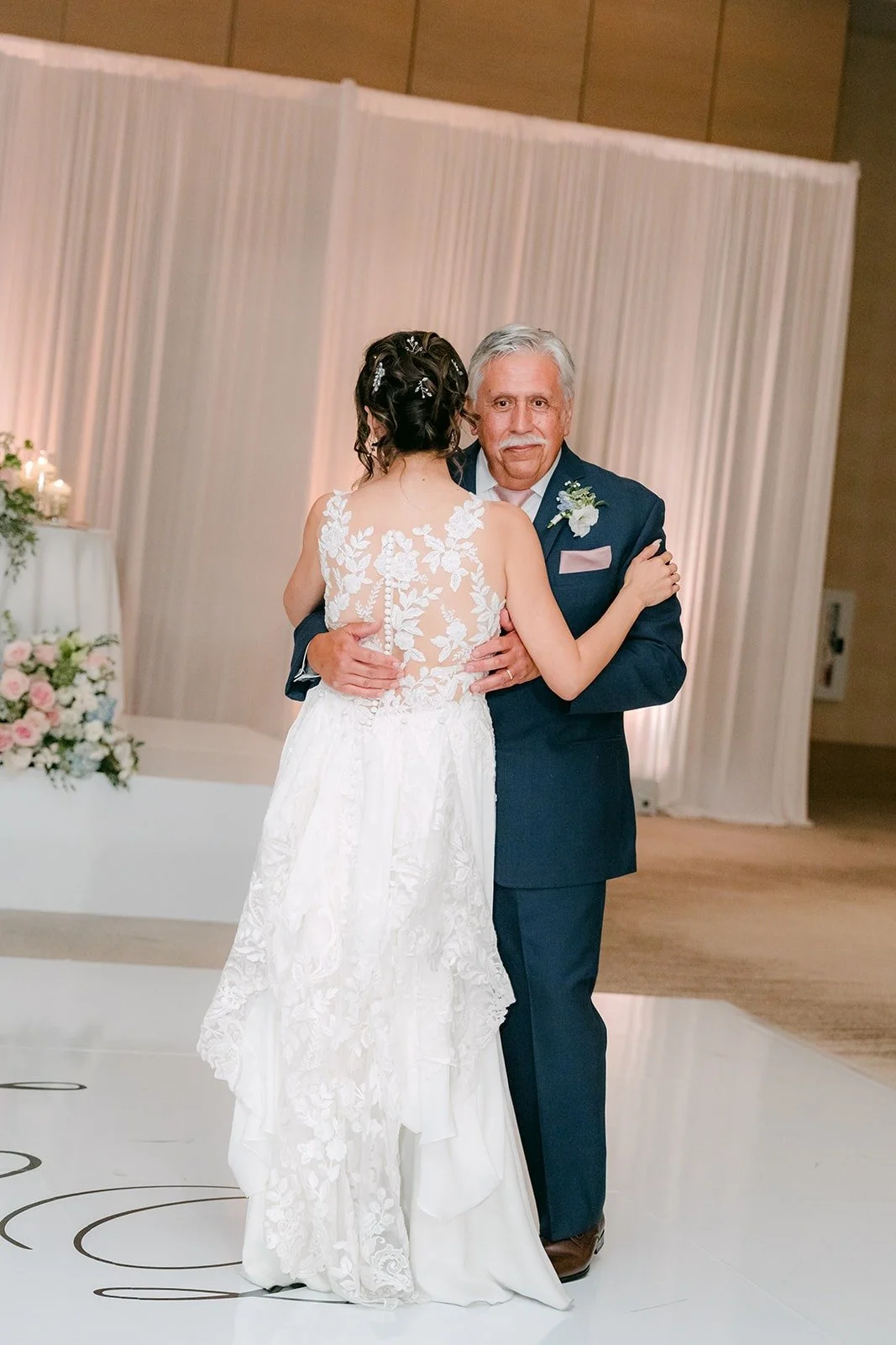 Francesca dances with her father in the Carousel Ballroom