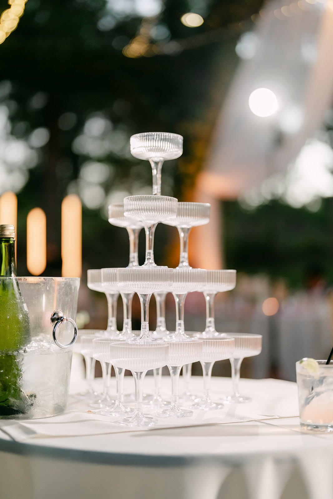 The champagne tower glowing at dusk.