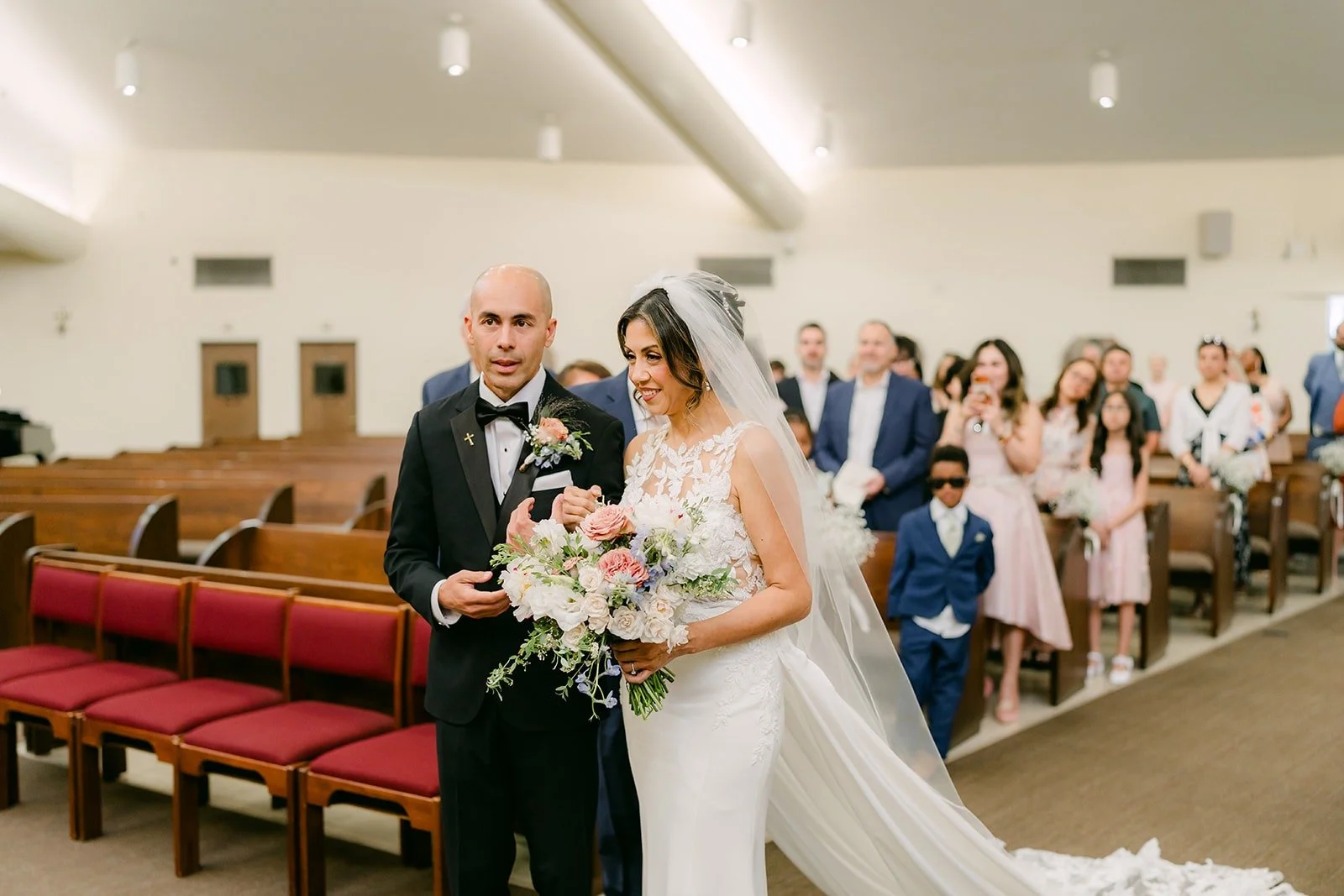 Francesca is given away at the front of the church