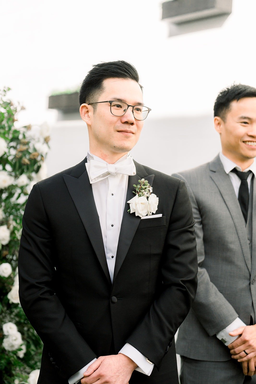 Alex smiles as Cindy comes down the aisle