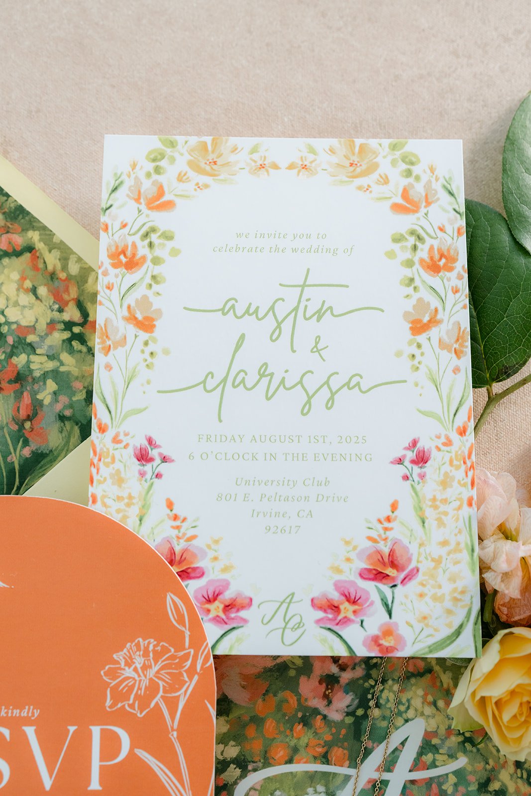 Close up of the floral watercolor wedding invitation