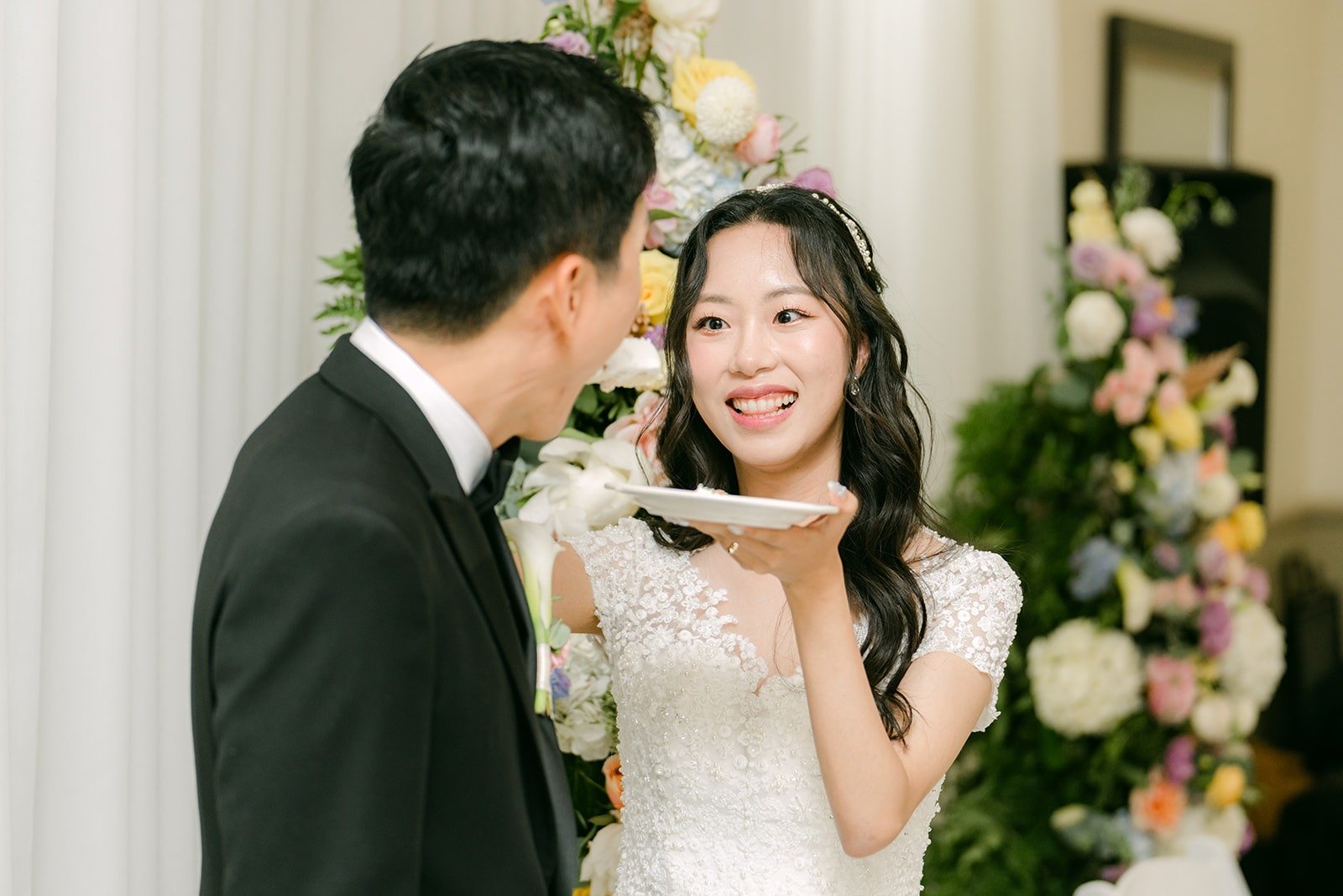 Eunsang feeding Jeannie a bite of cake, photographed by One and Only Production