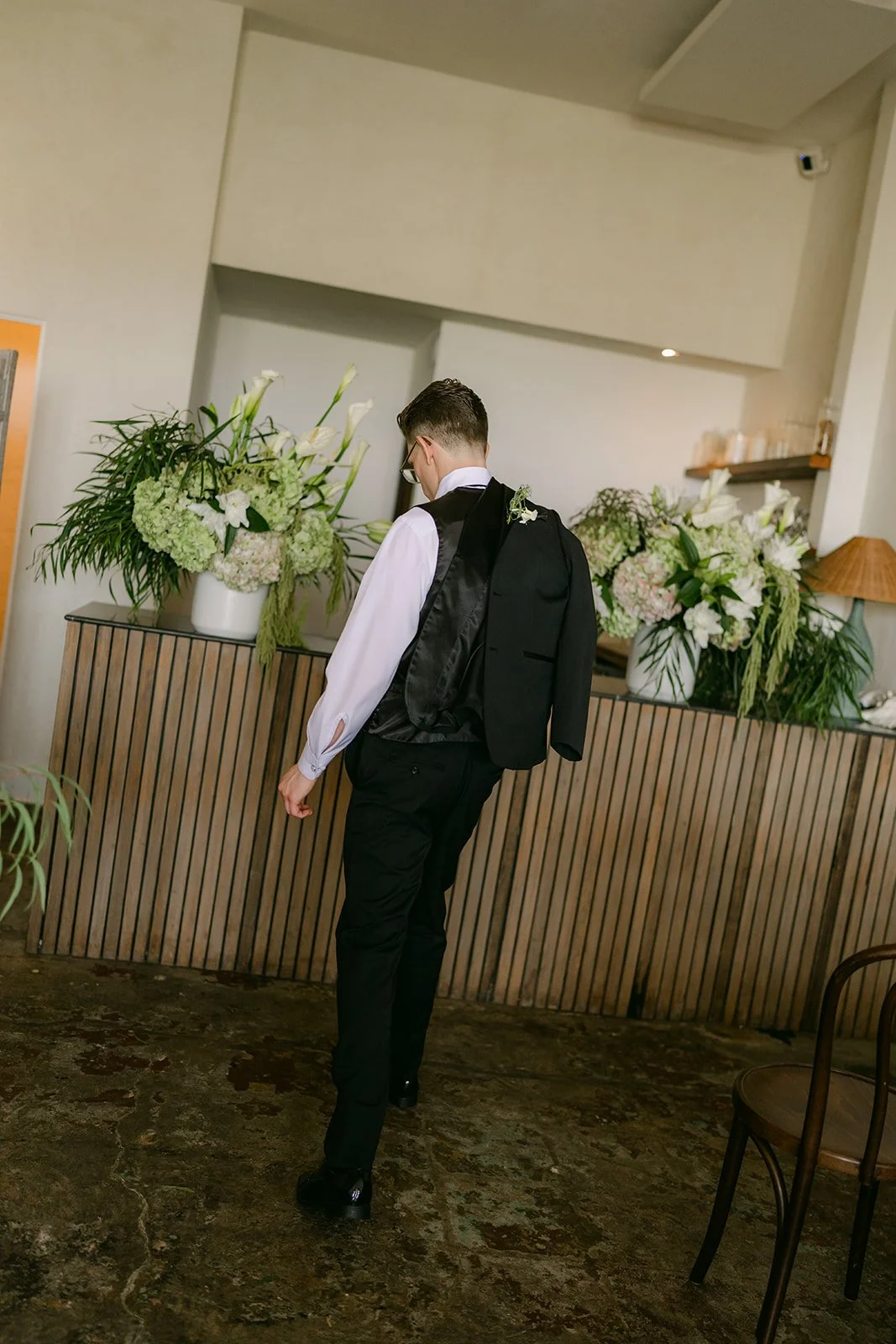 Matthew putting on his jacket