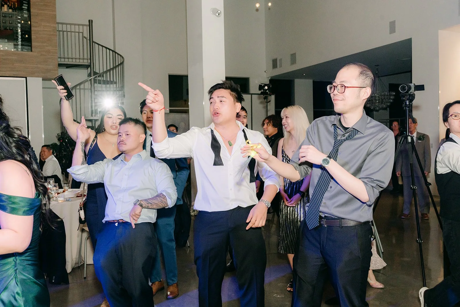 Groomsmen dancing at the reception