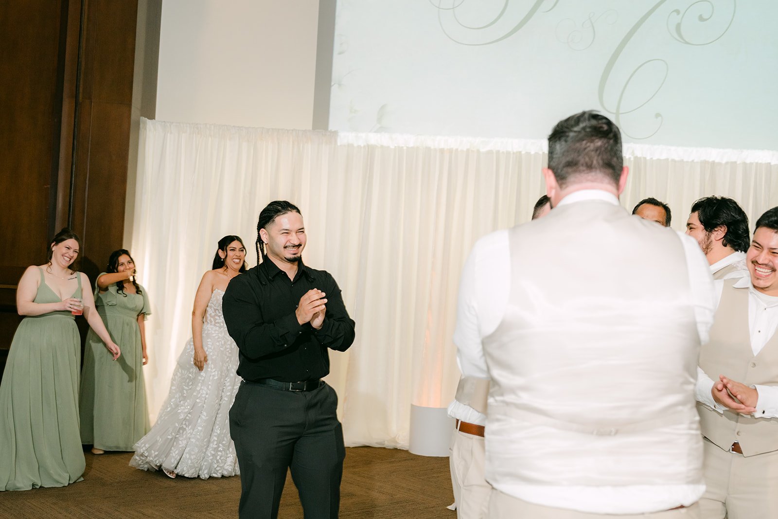 Cody tossing the garter.