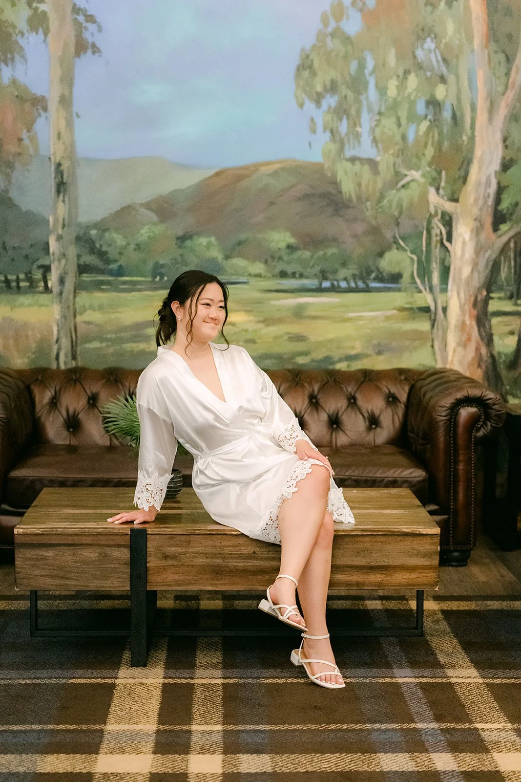 Jessica relaxing in her robe in the lounge